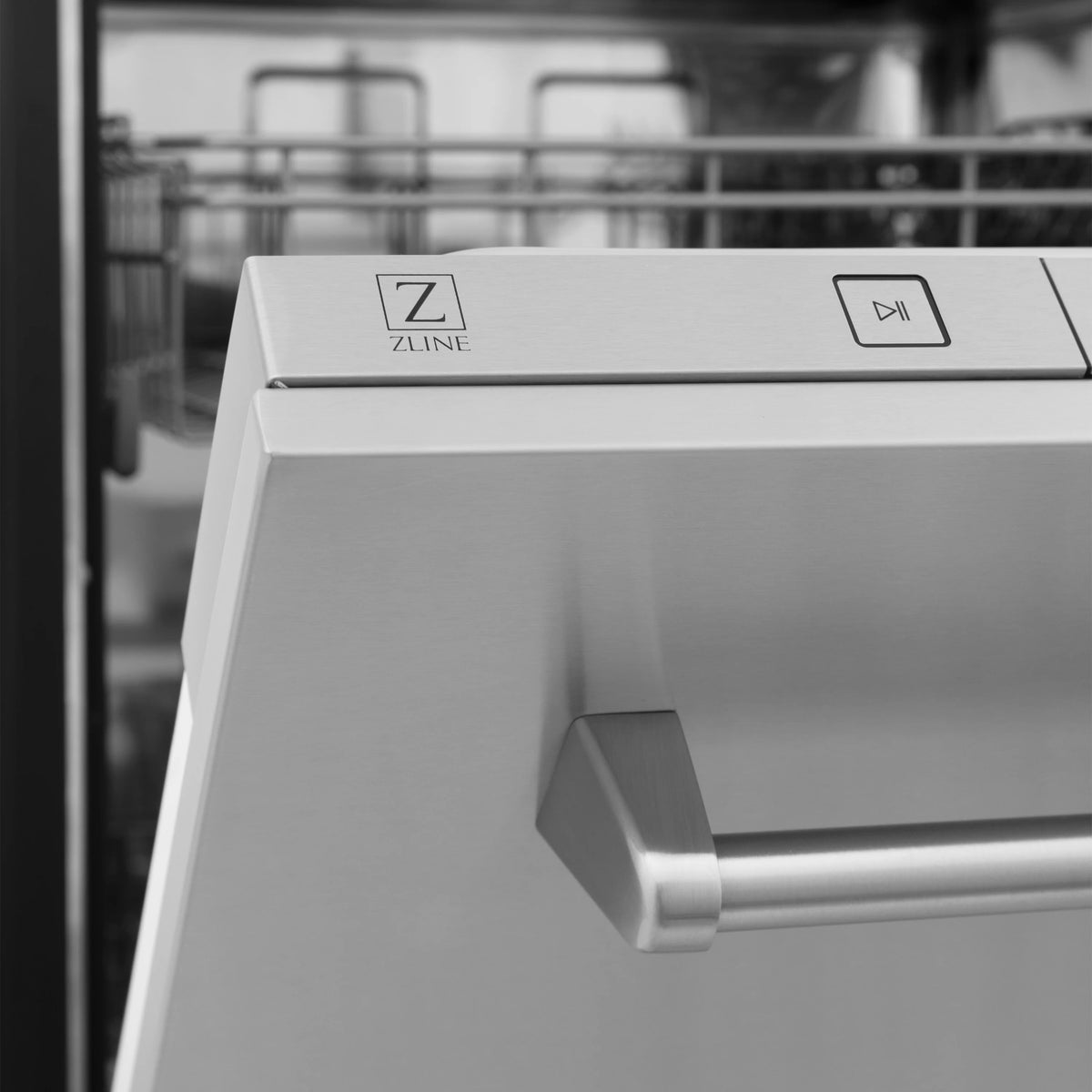 Dishwasher control panel and traditional handle on satin stainless door.
