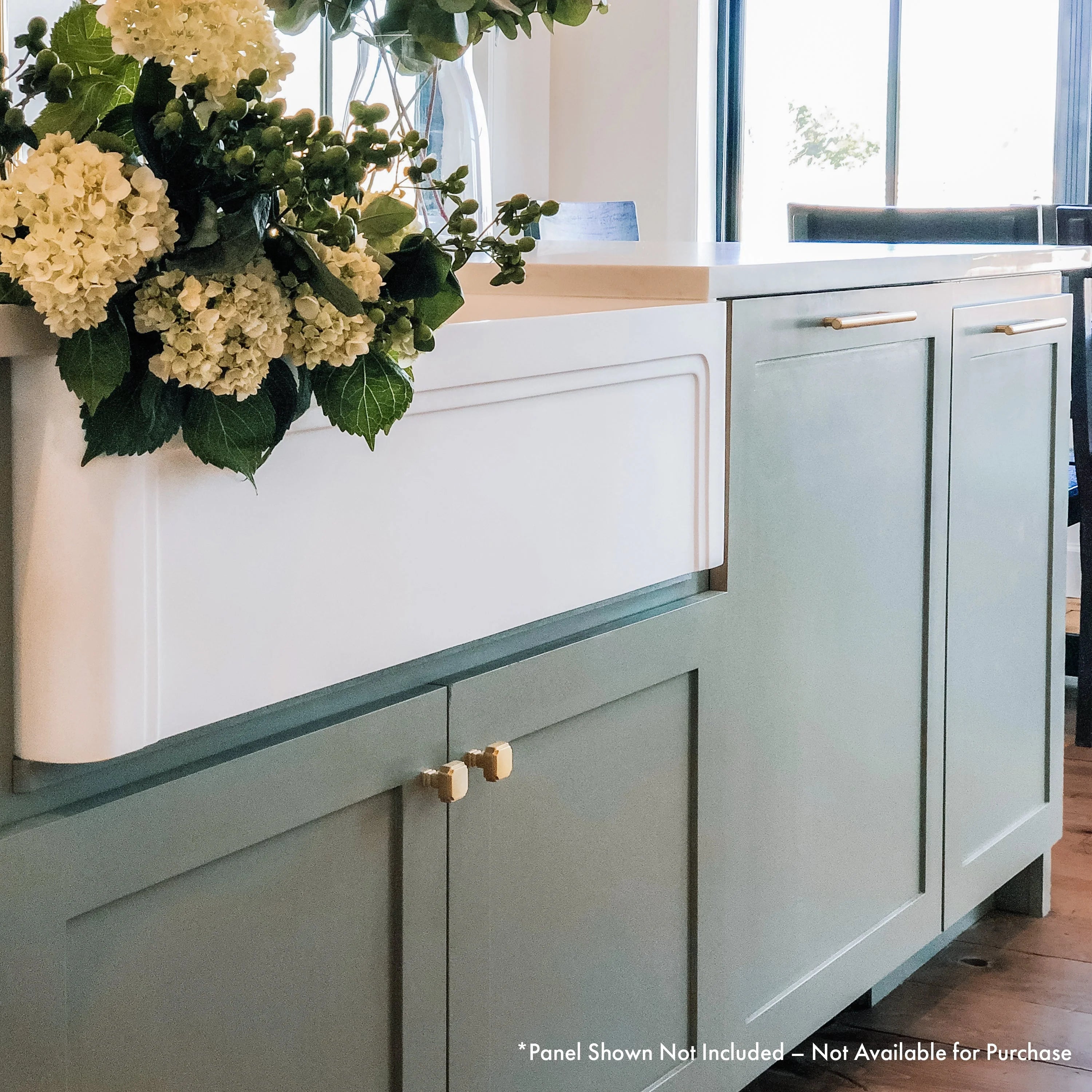 Built-in panel-ready dishwasher installed under a countertop with top control area