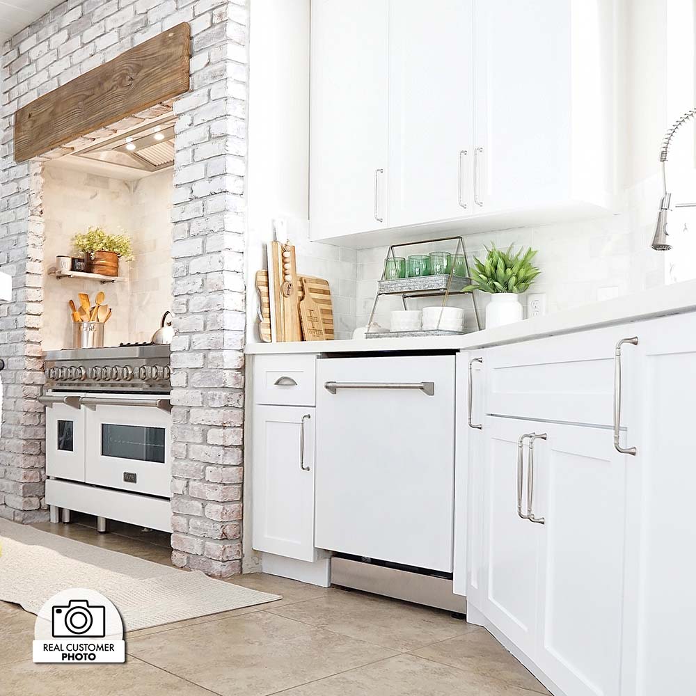 24-inch matte white dishwasher with traditional handle and stainless steel tub