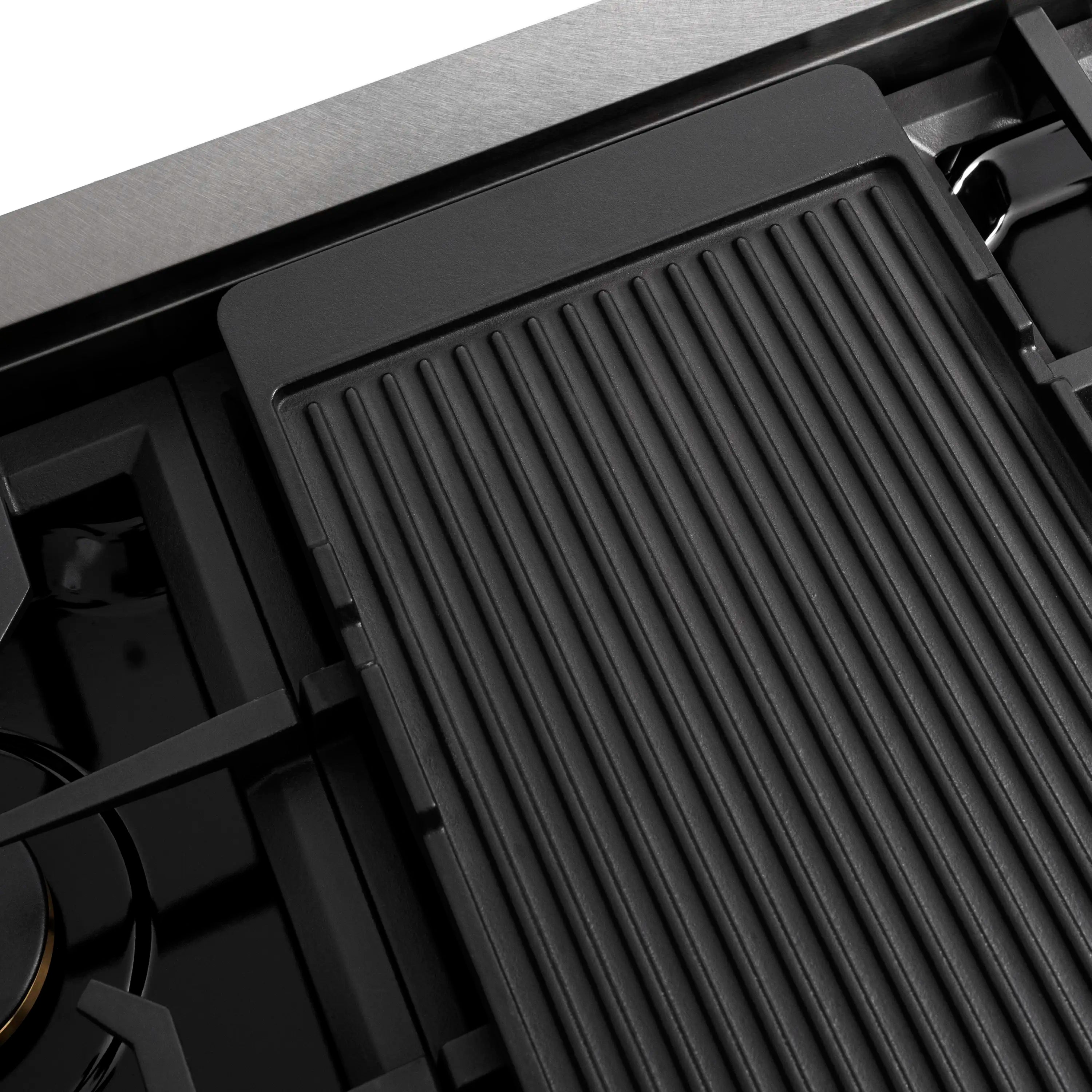 Porcelain cooktop surface with ribbed burner grate insert and black burner cap
