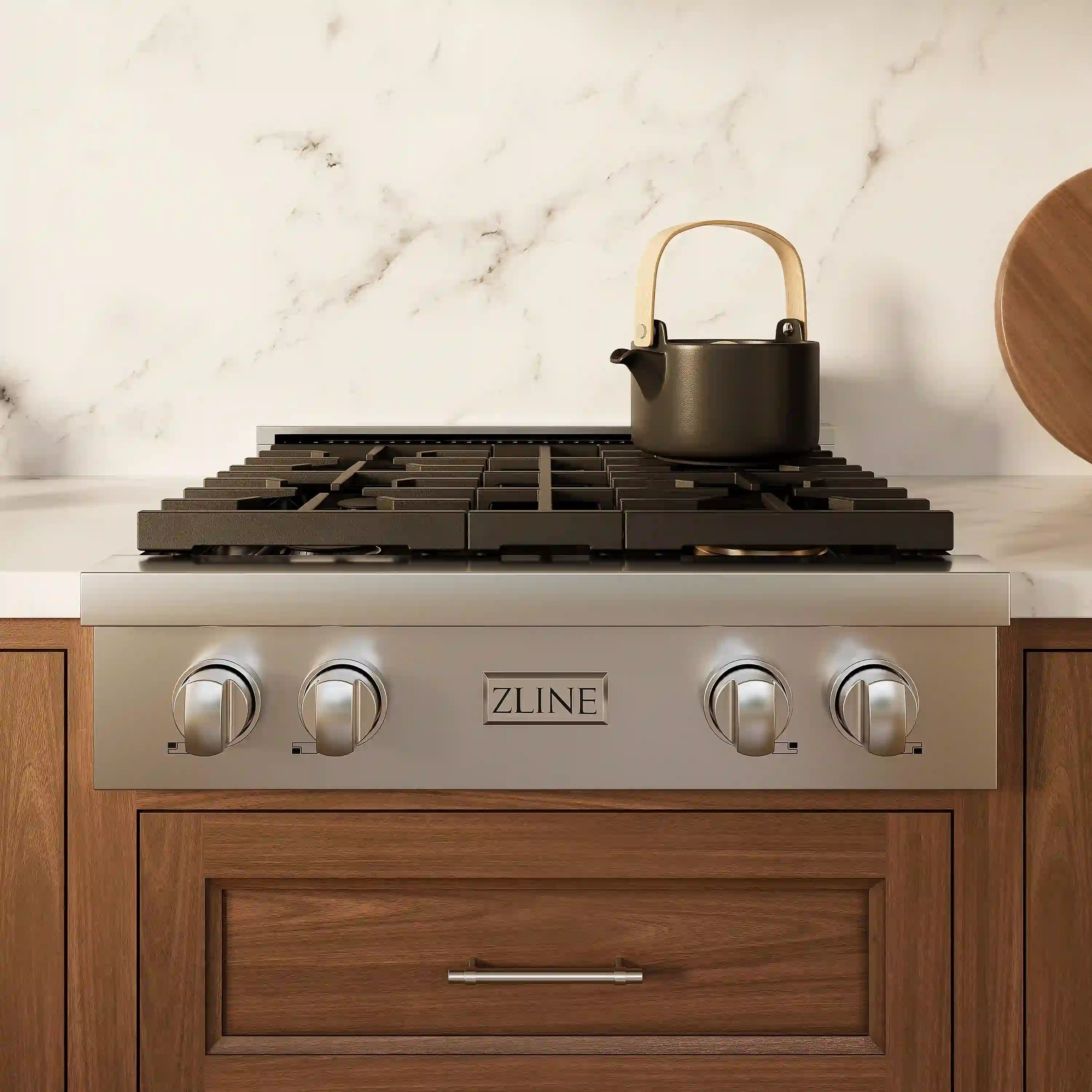 Stainless steel 4-burner gas rangetop with black grates and front control knobs