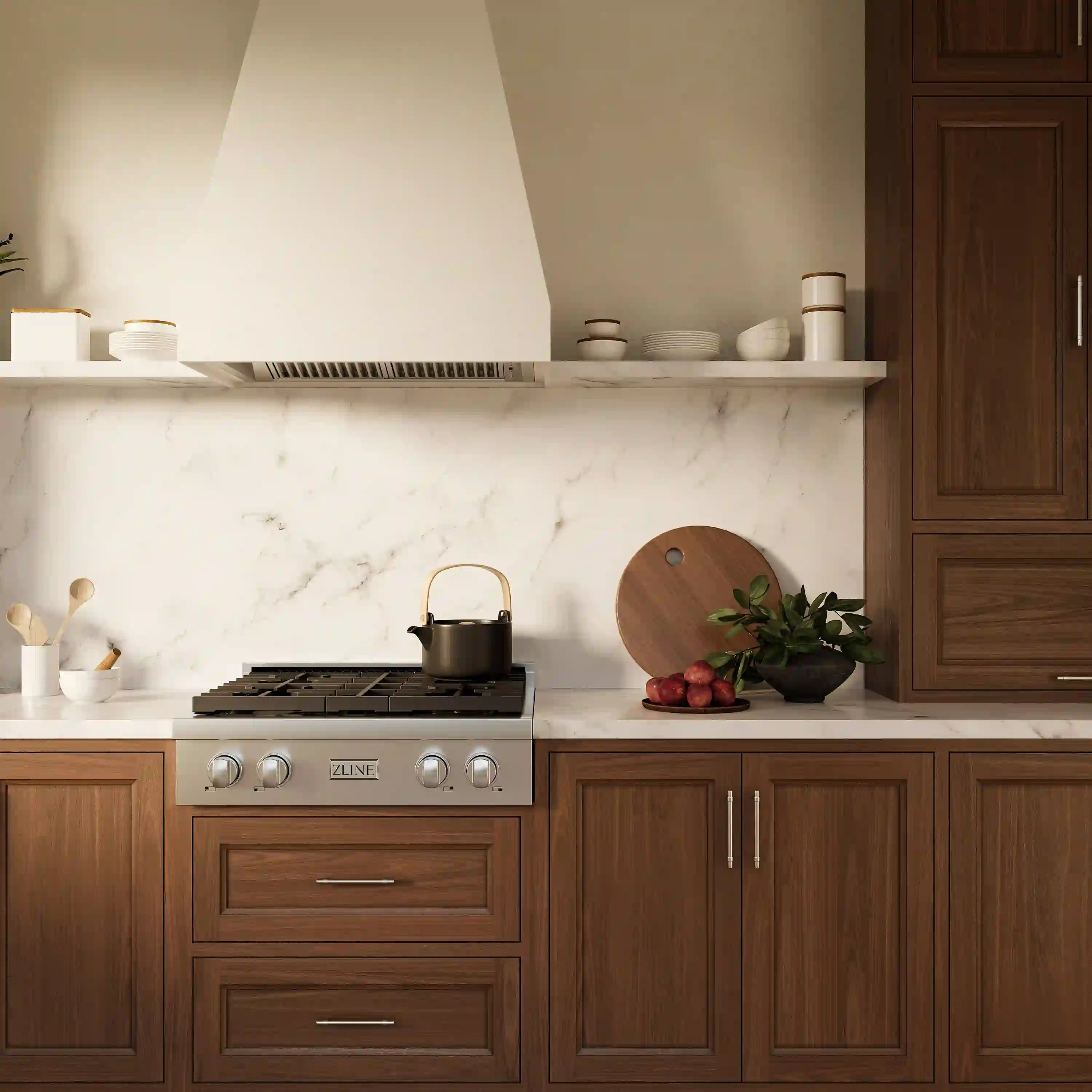 Stainless steel 4-burner gas rangetop with black grates and centered burner control knobs