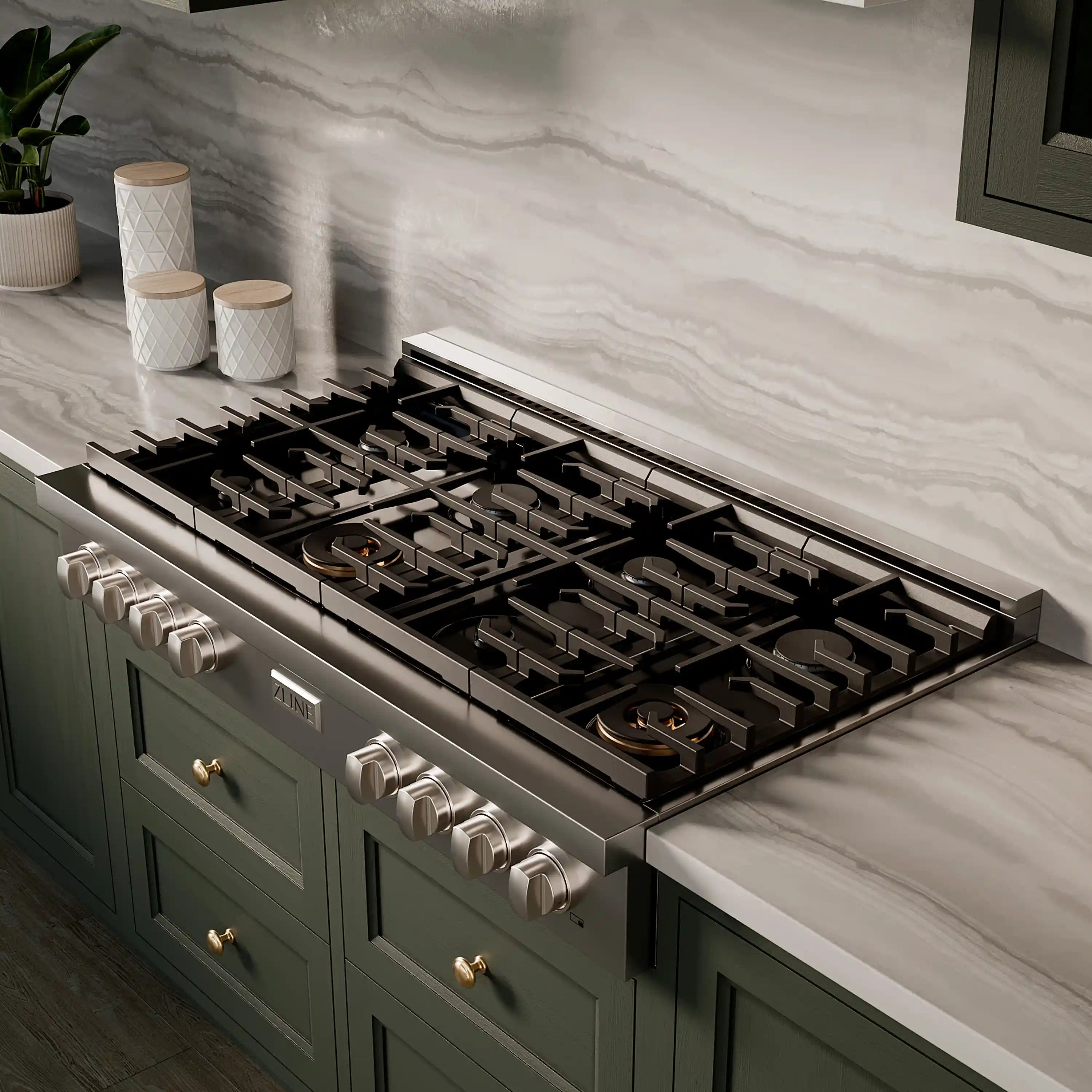 Stainless steel gas rangetop with black burner grates and front control knobs