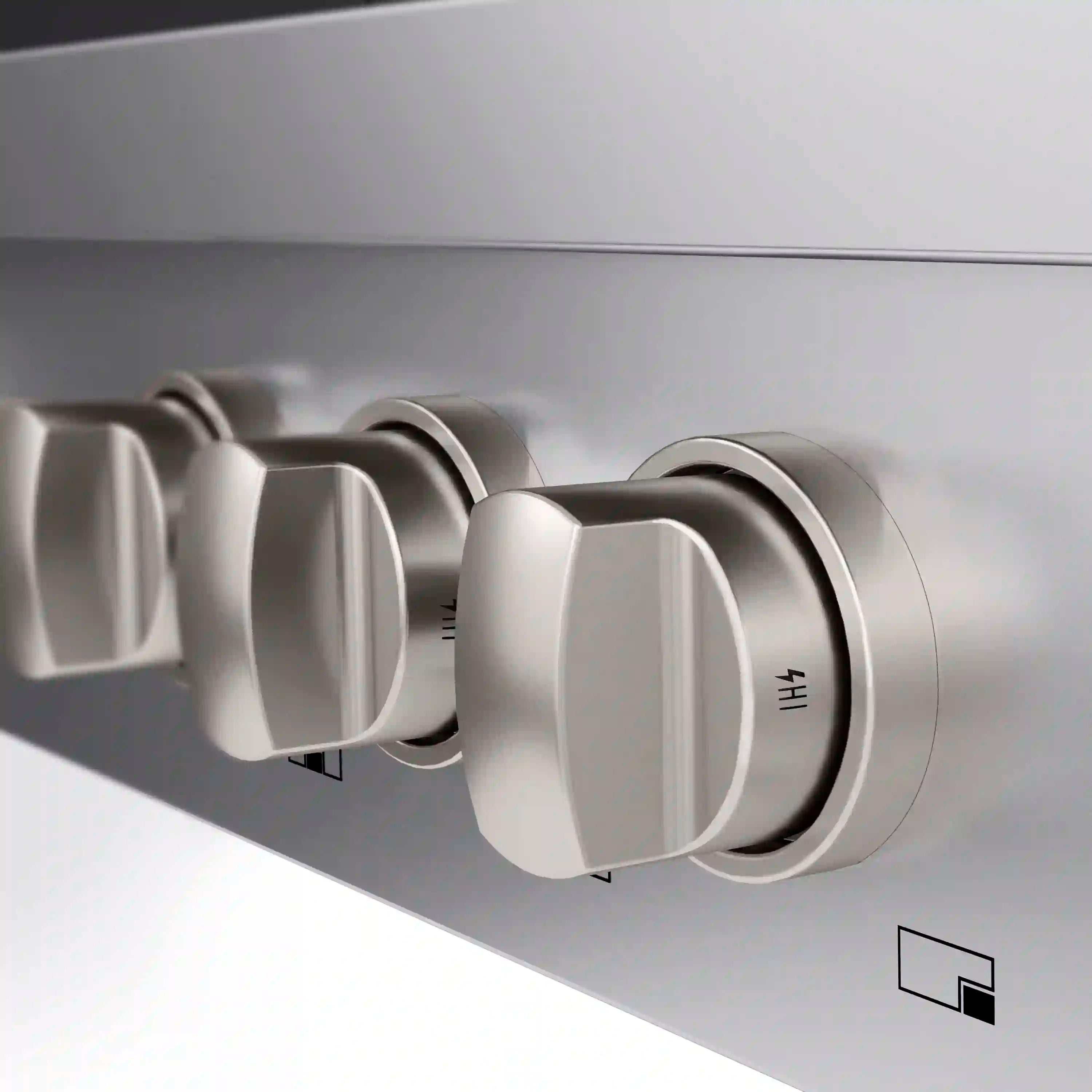Stainless steel control knob with burner markings on a gas rangetop