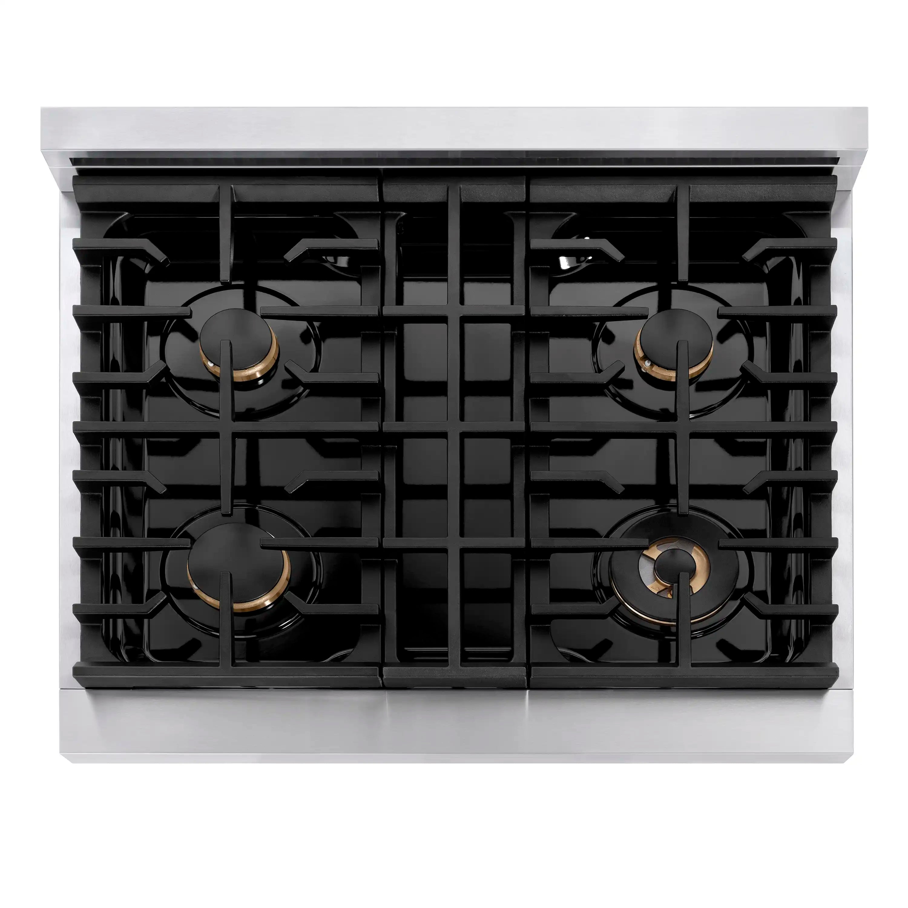 Front view of black burner grates on gas rangetop with four brass-ring burners
