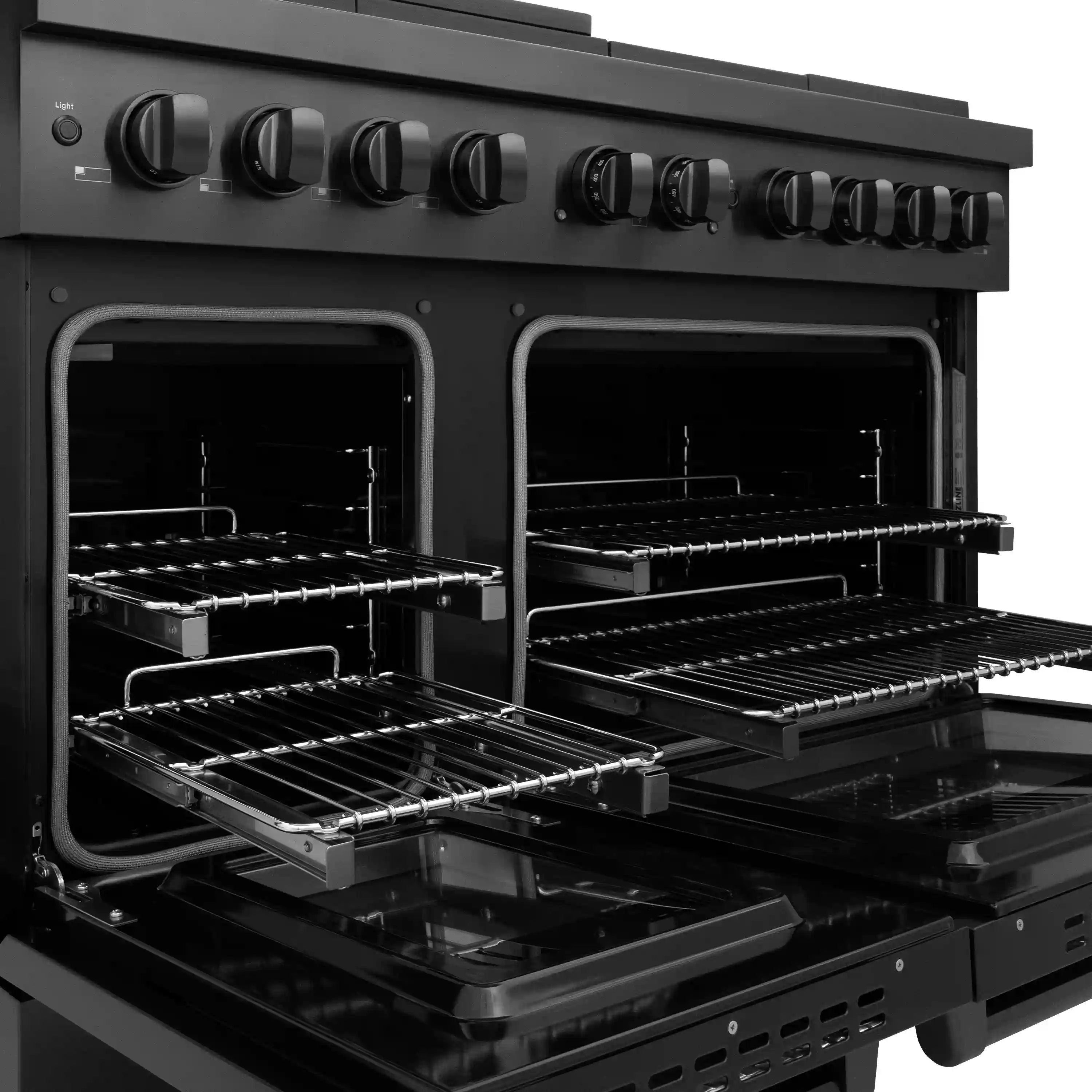 Open ovens of a black ZLINE dual-fuel range with wire racks and heating elements