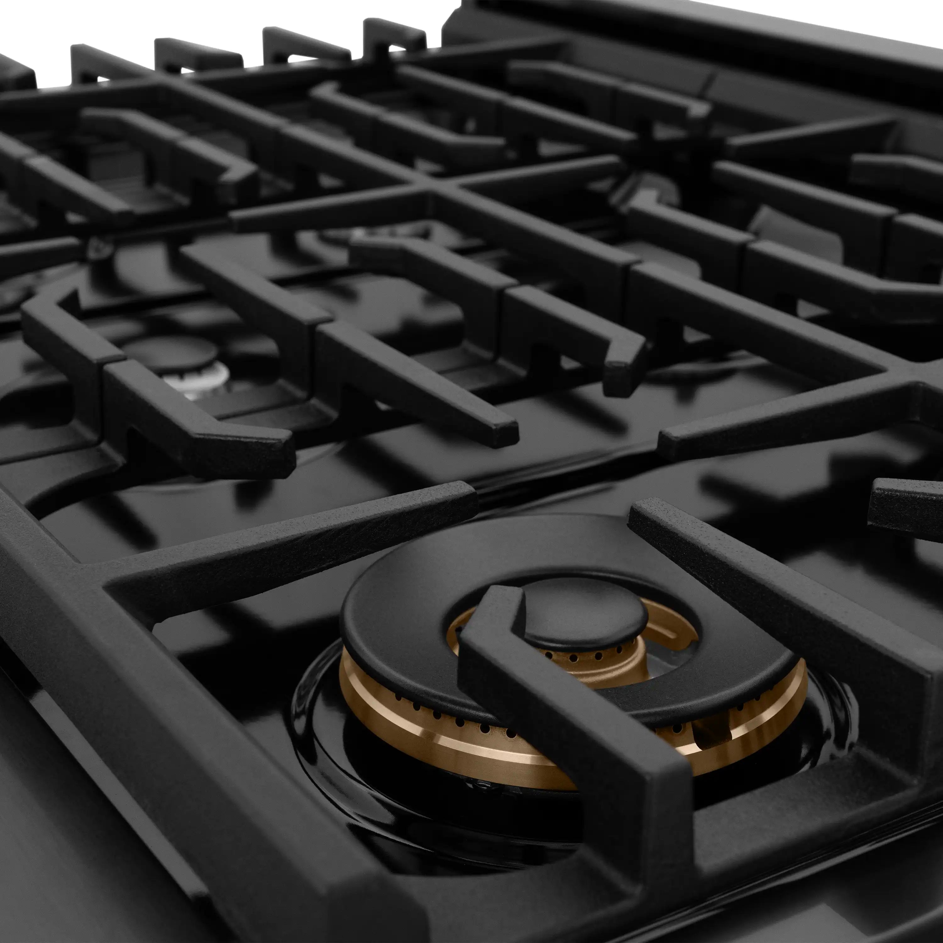 Black gas burner with brass burner head and round cap