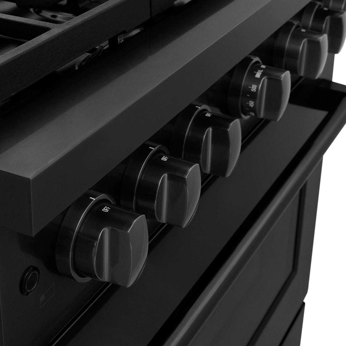 Front control knobs on black stainless steel gas range