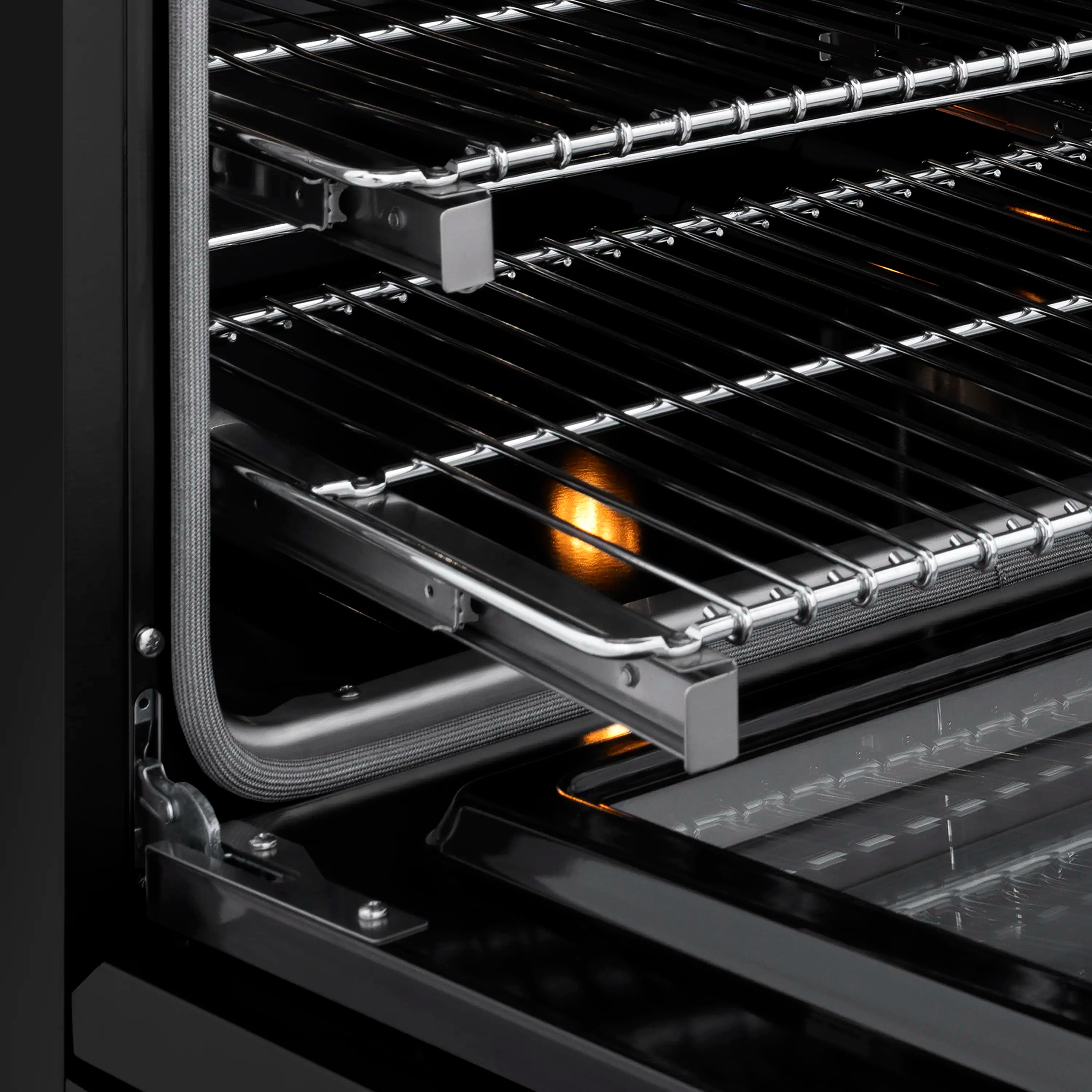 Convection oven interior with racks, heating elements, and warm oven light
