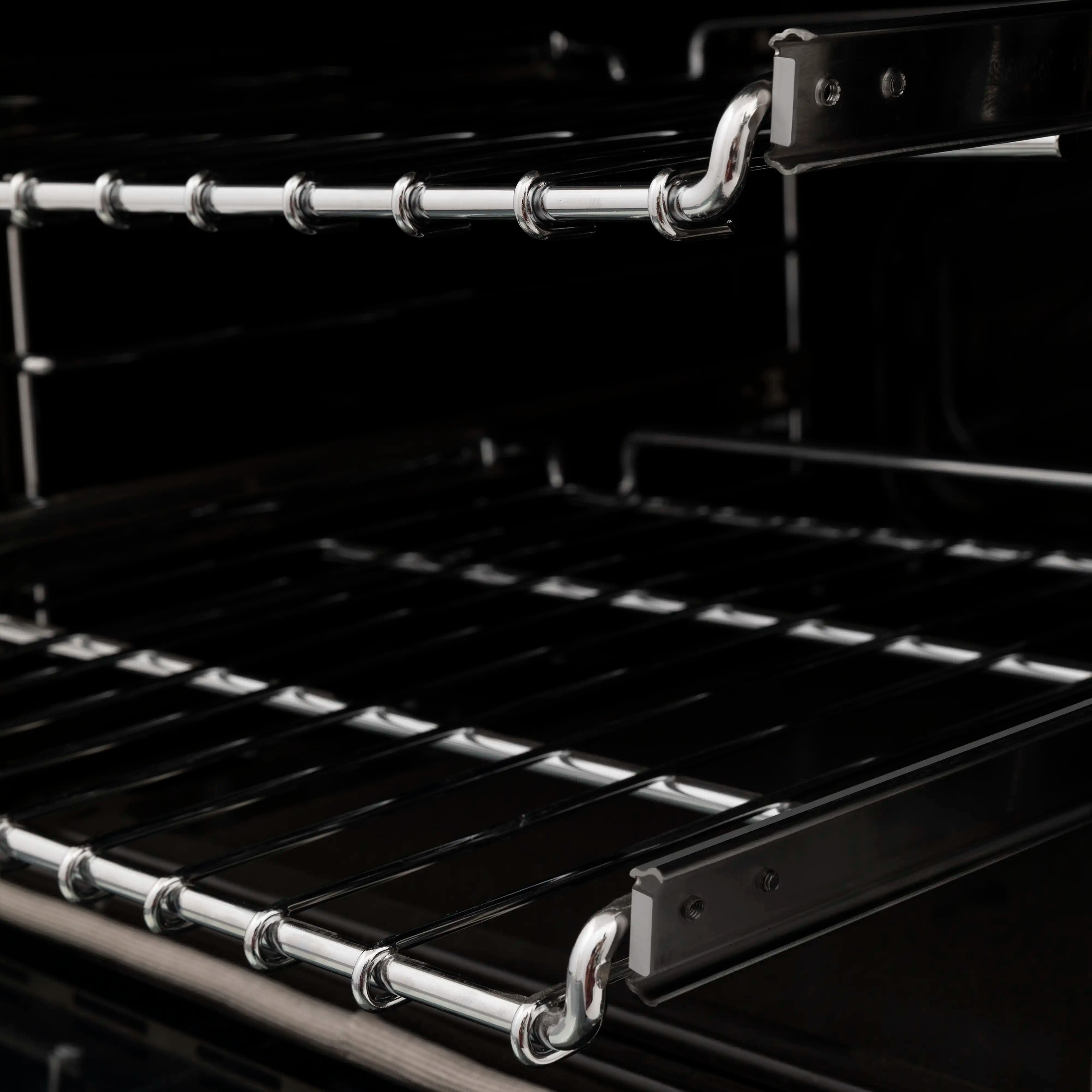 Dual fuel oven interior with black racks and chrome side rails