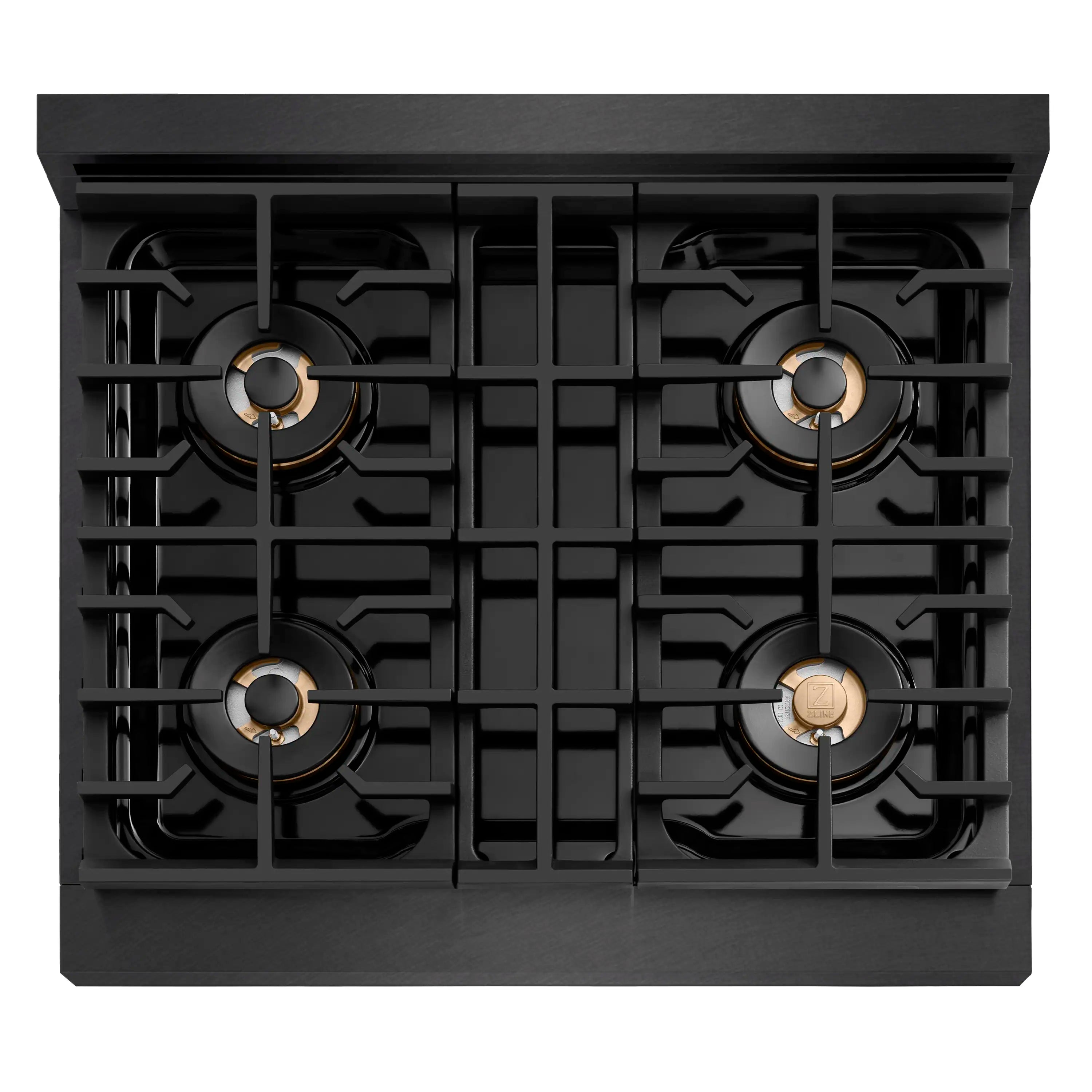 Top view of black four-burner cooktop with four burner caps and rings