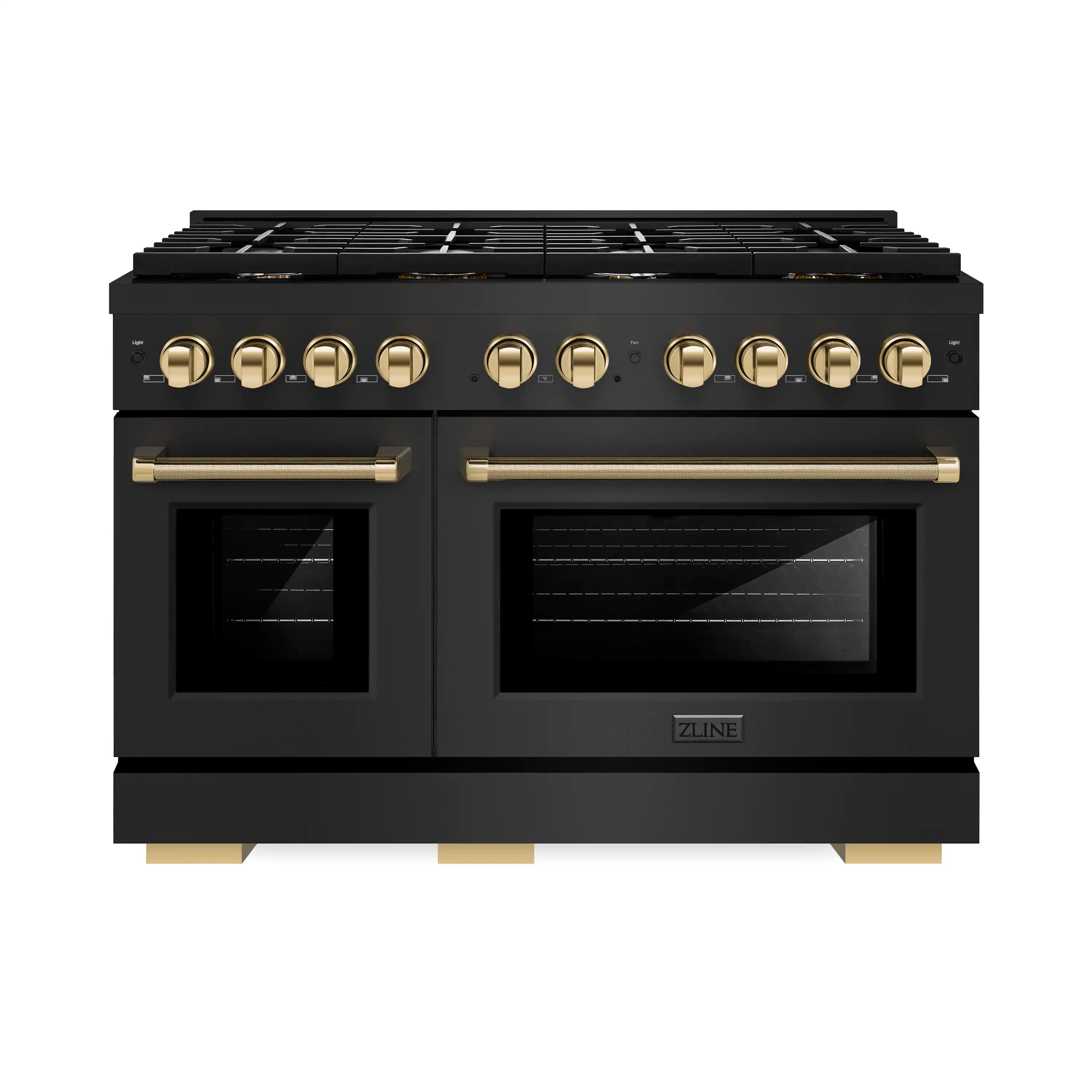 Black dual fuel range top with gold control knobs and two oven doors.