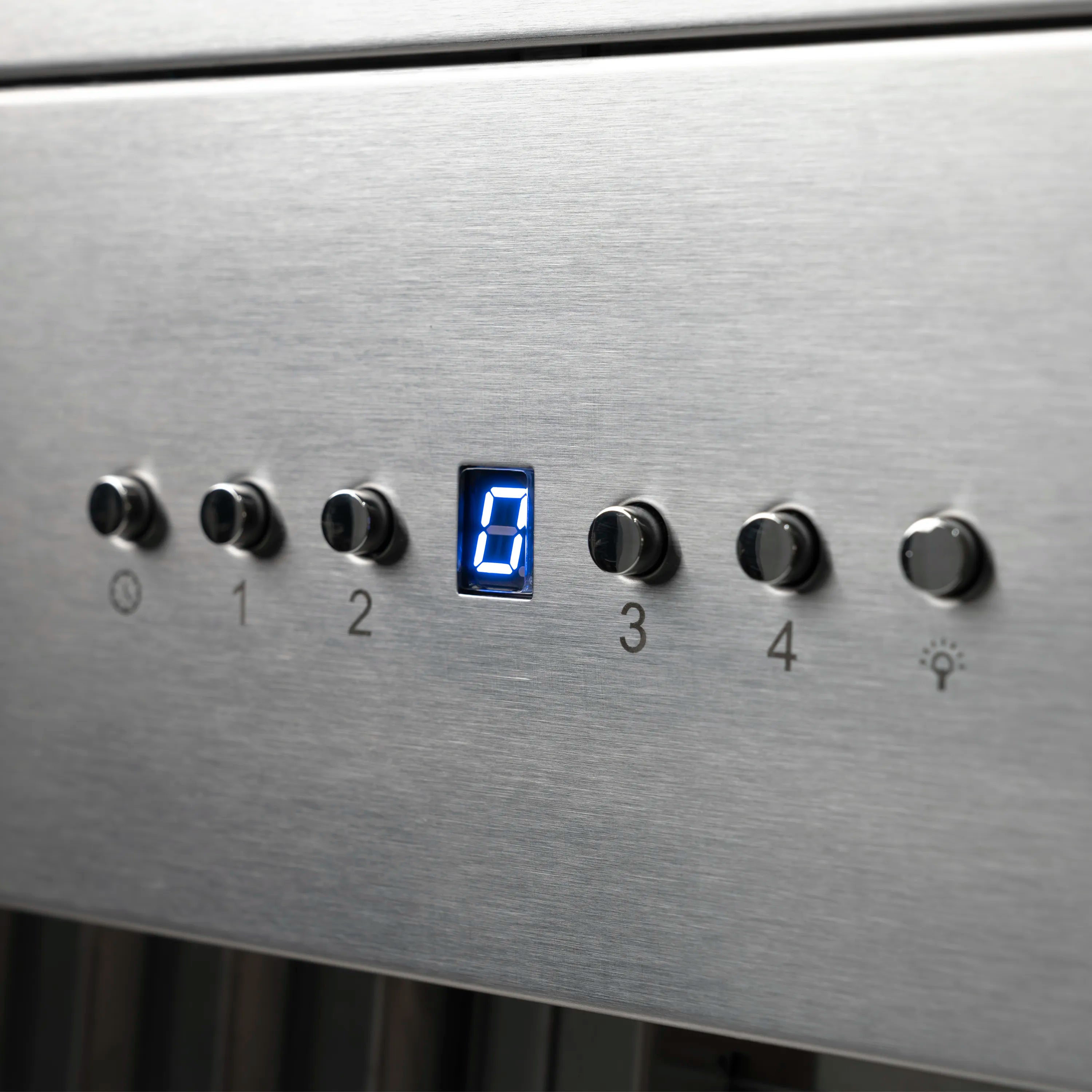 Stainless steel control panel with black knobs and blue digital display