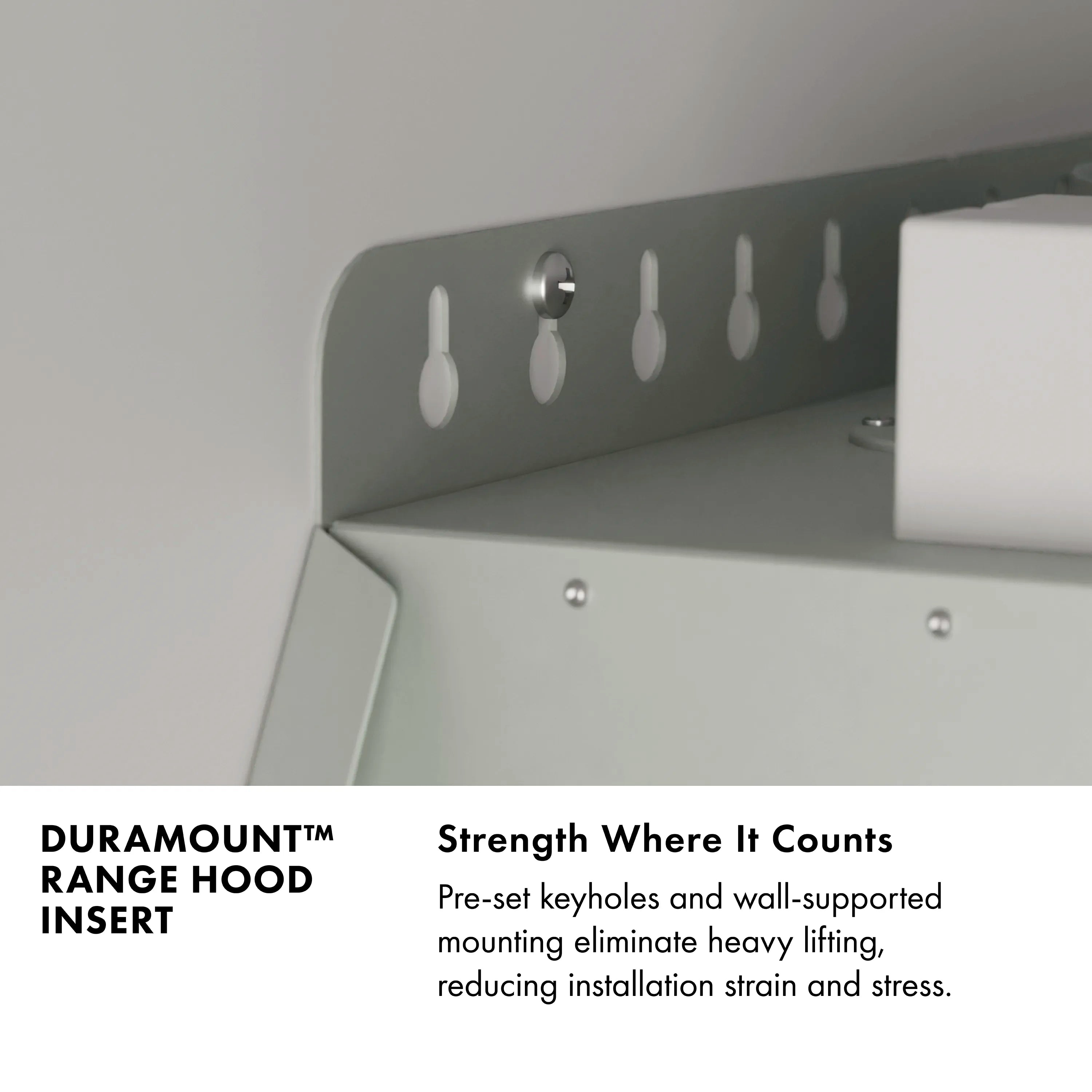 Stainless steel hood insert underside with mounting bracket and pre-set keyhole openings