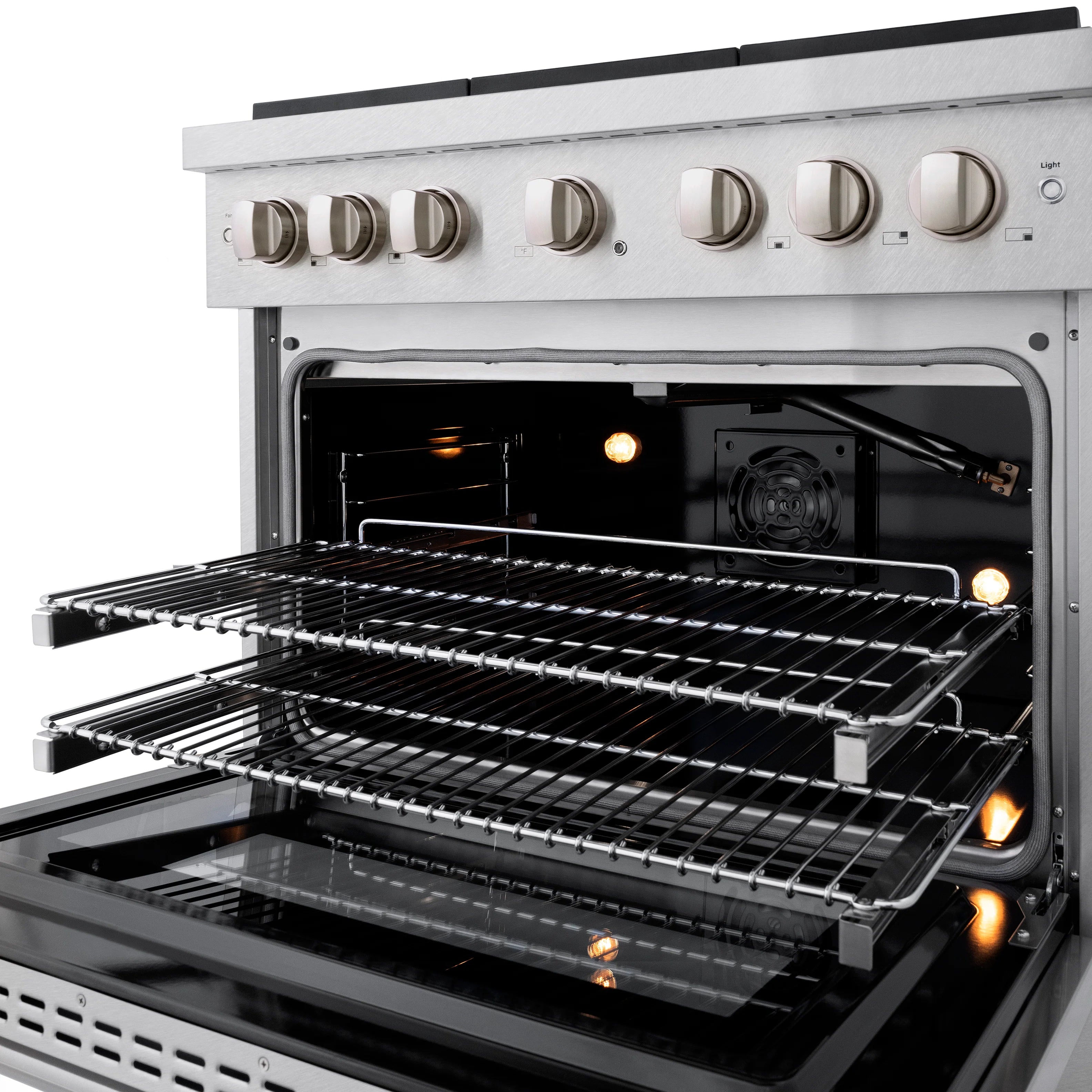 Stainless steel oven with multiple racks and interior lights on