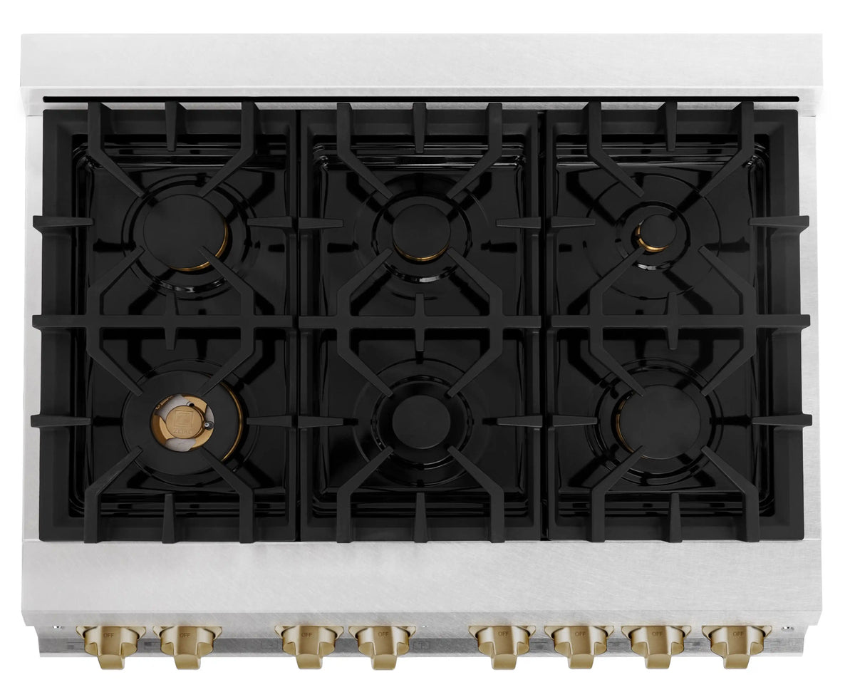Dual fuel range cooktop burner layout with black cast burners and brass valve bases