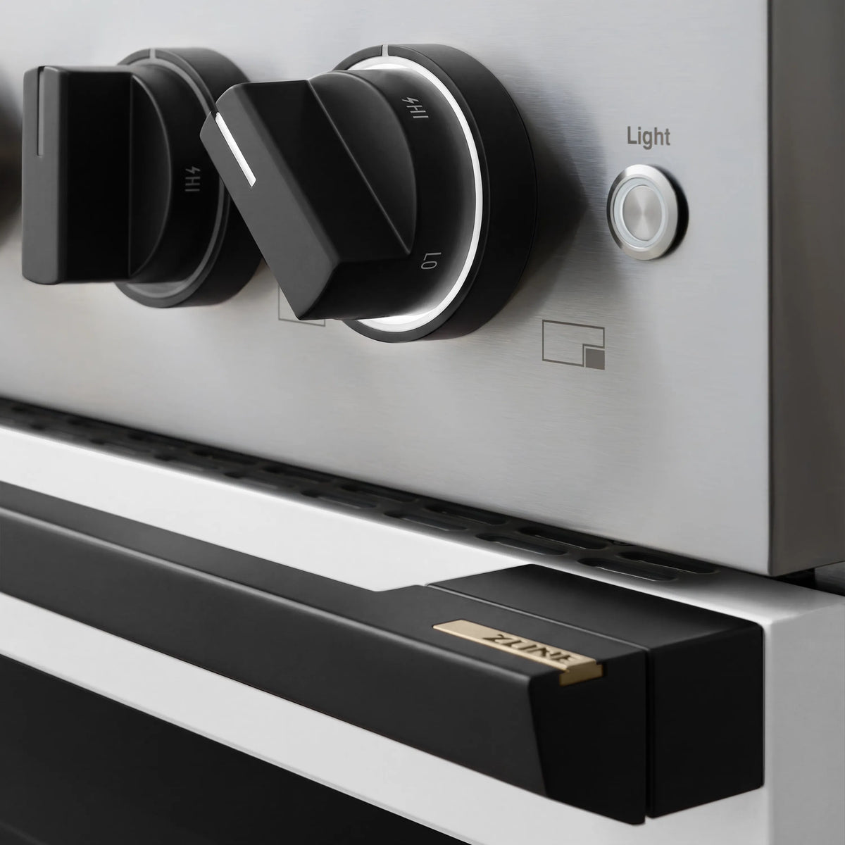 Stainless gas range control knob and matte black control panel