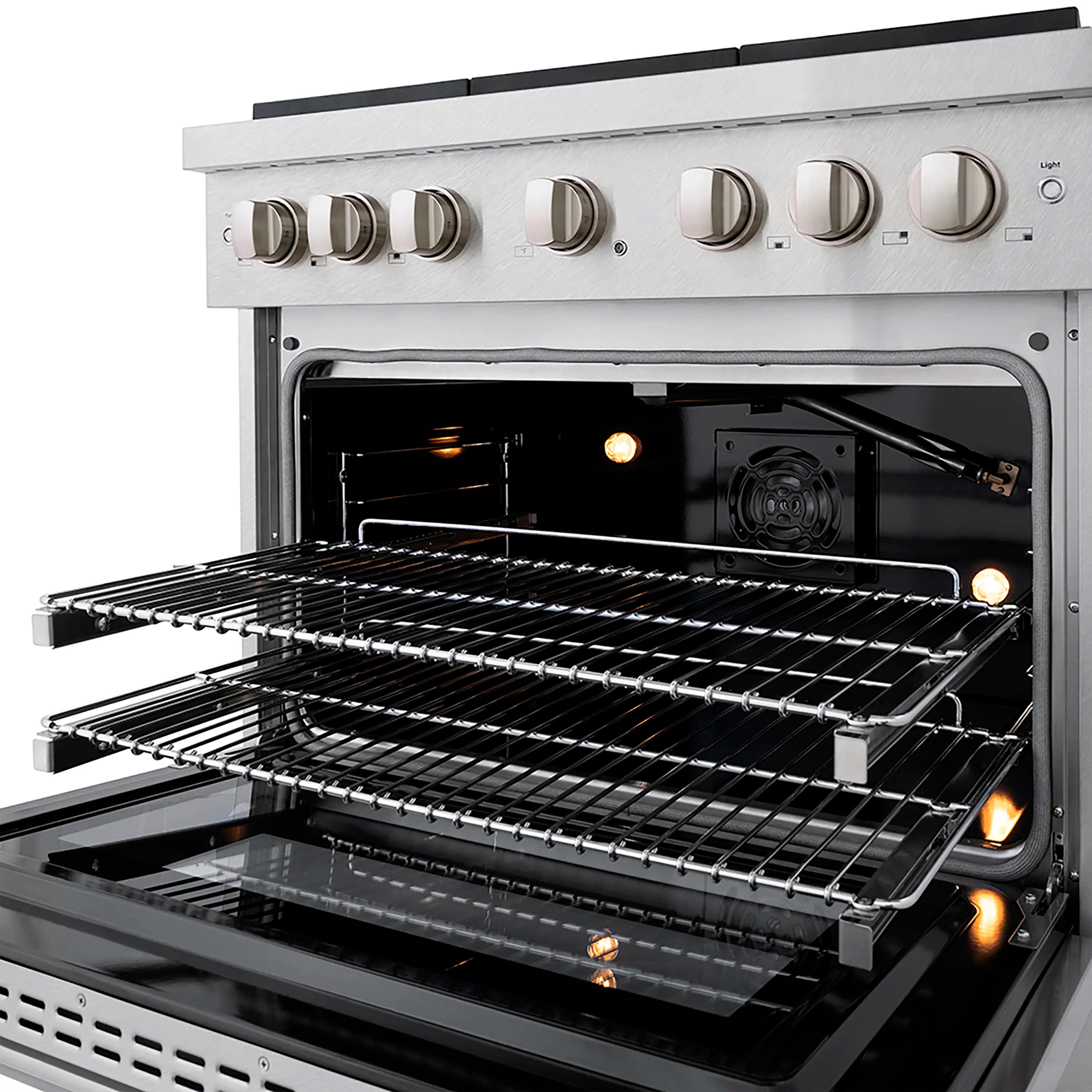 Gas oven door open showing glowing burners and removable wire racks