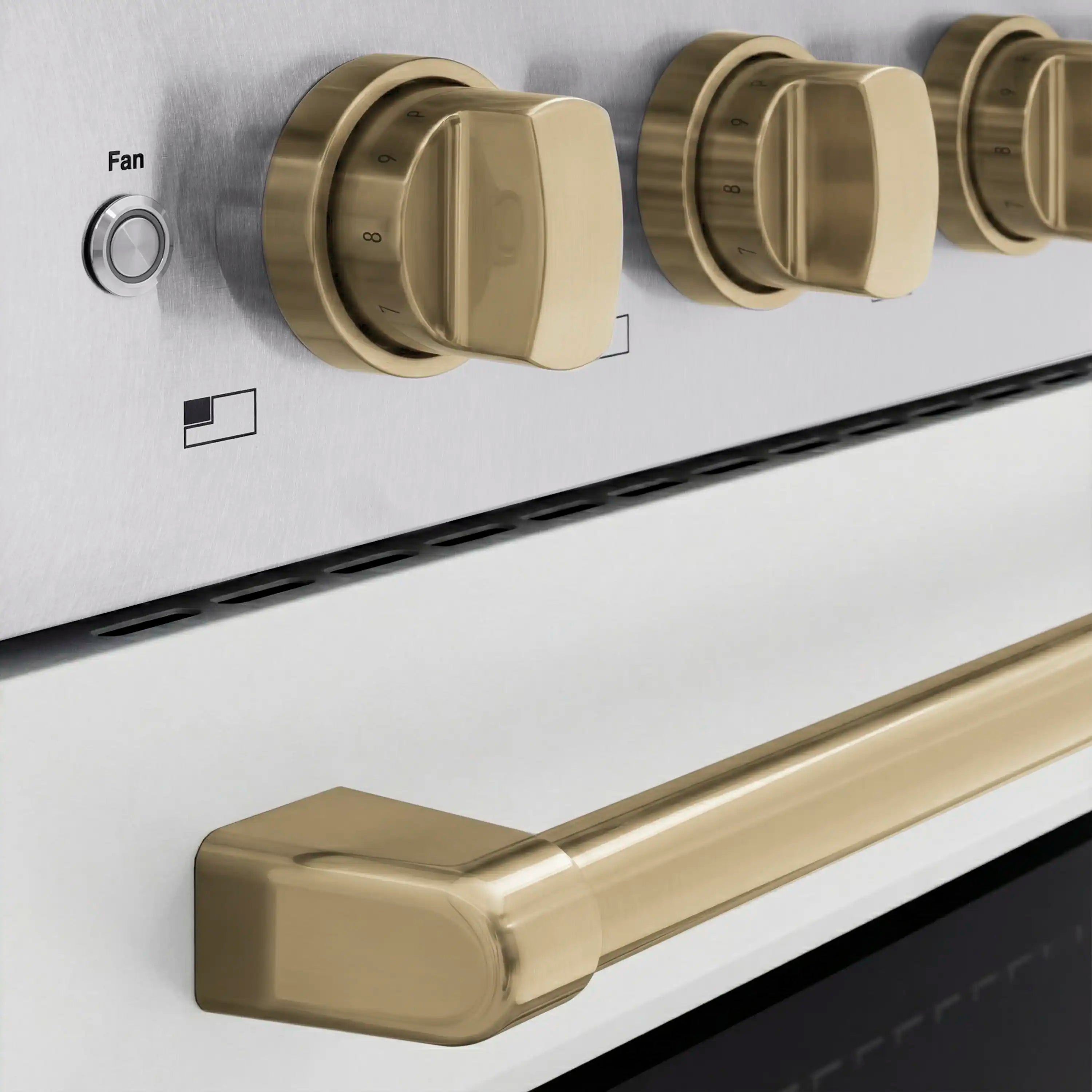 Induction range control panel with three champagne bronze knobs on satin stainless faceplate