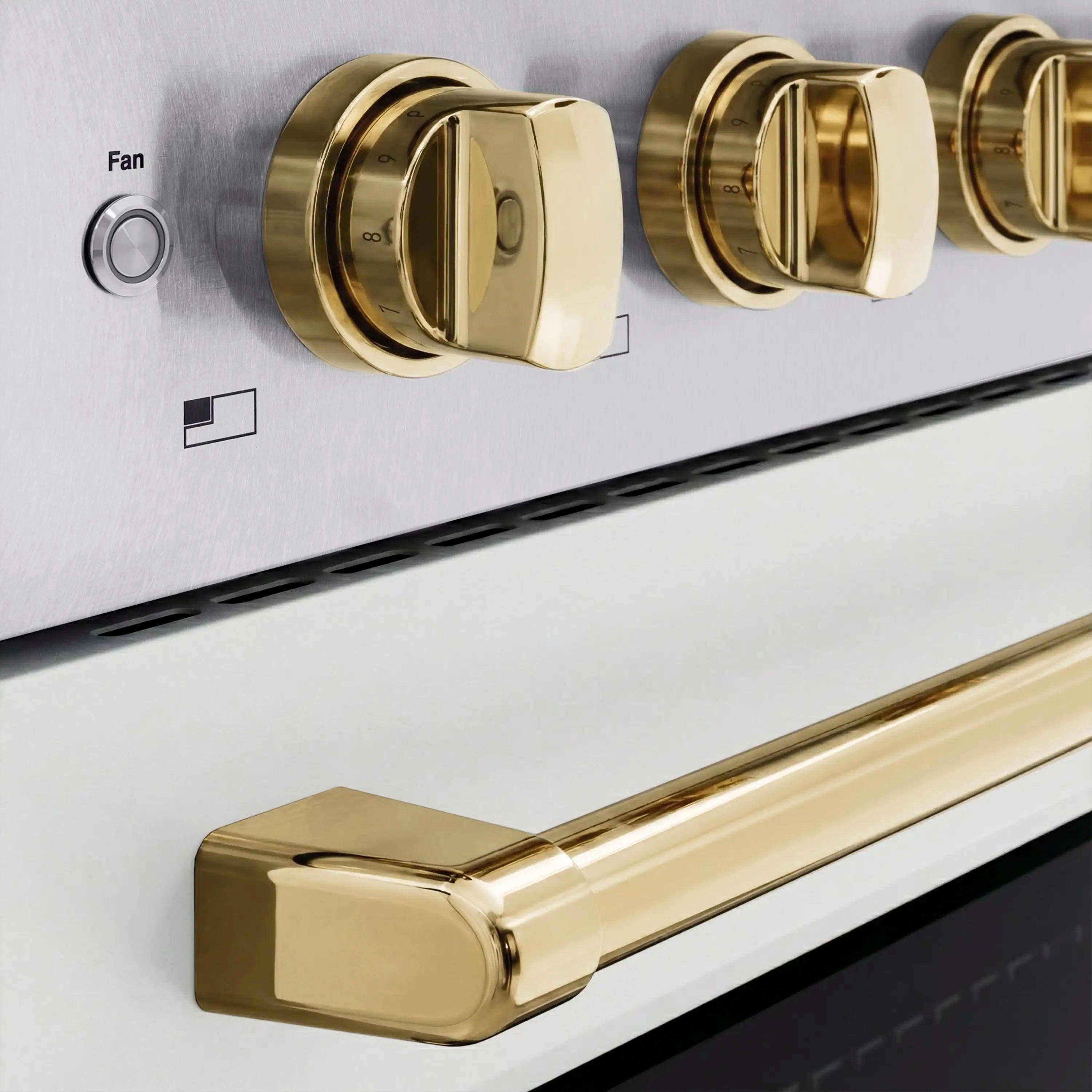 Gold control knobs on satin stainless front panel with white matte trim