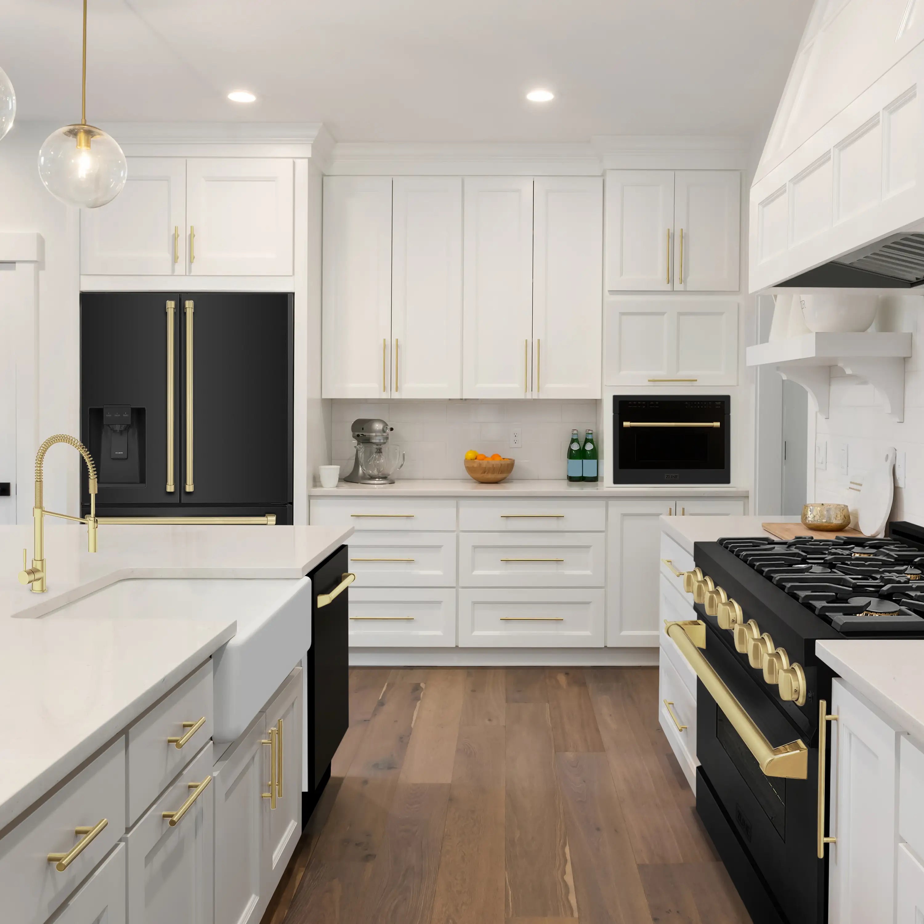 Black stainless refrigerator with champagne-bronze handles in a modern kitchen setup