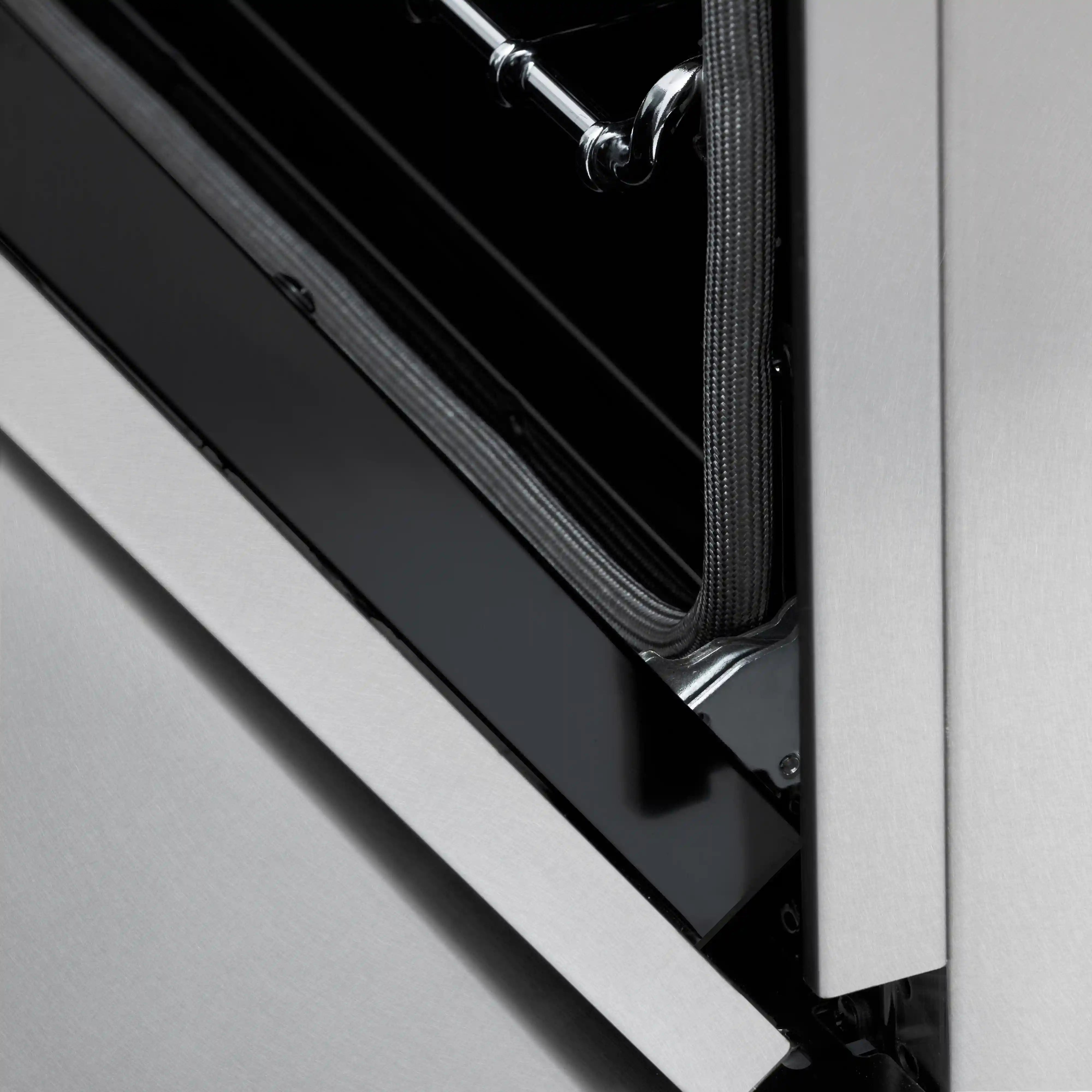 Gas range oven door opening with satin stainless frame and black interior panel