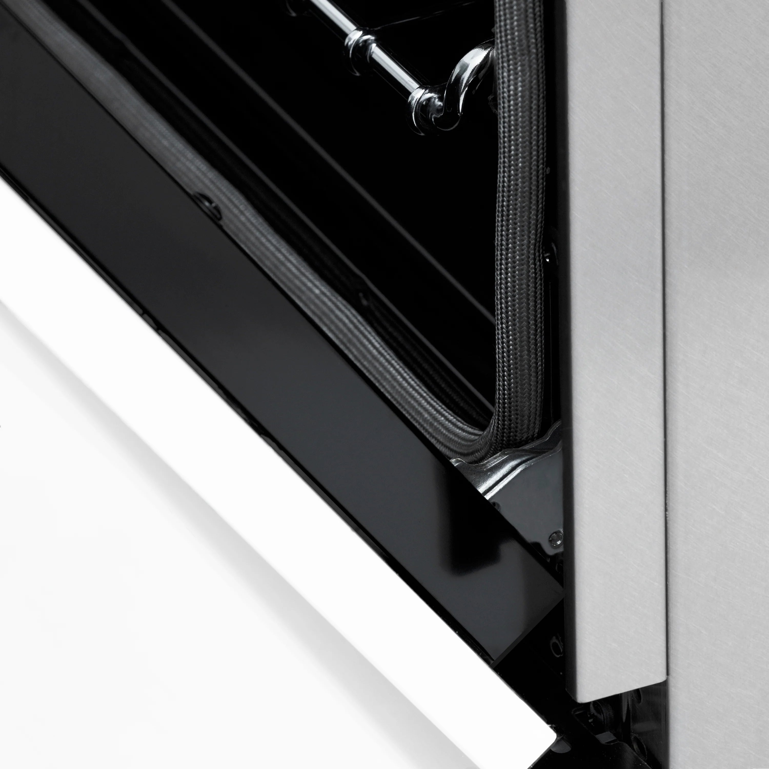 Oven door open showing black gasket seal and inner frame edge
