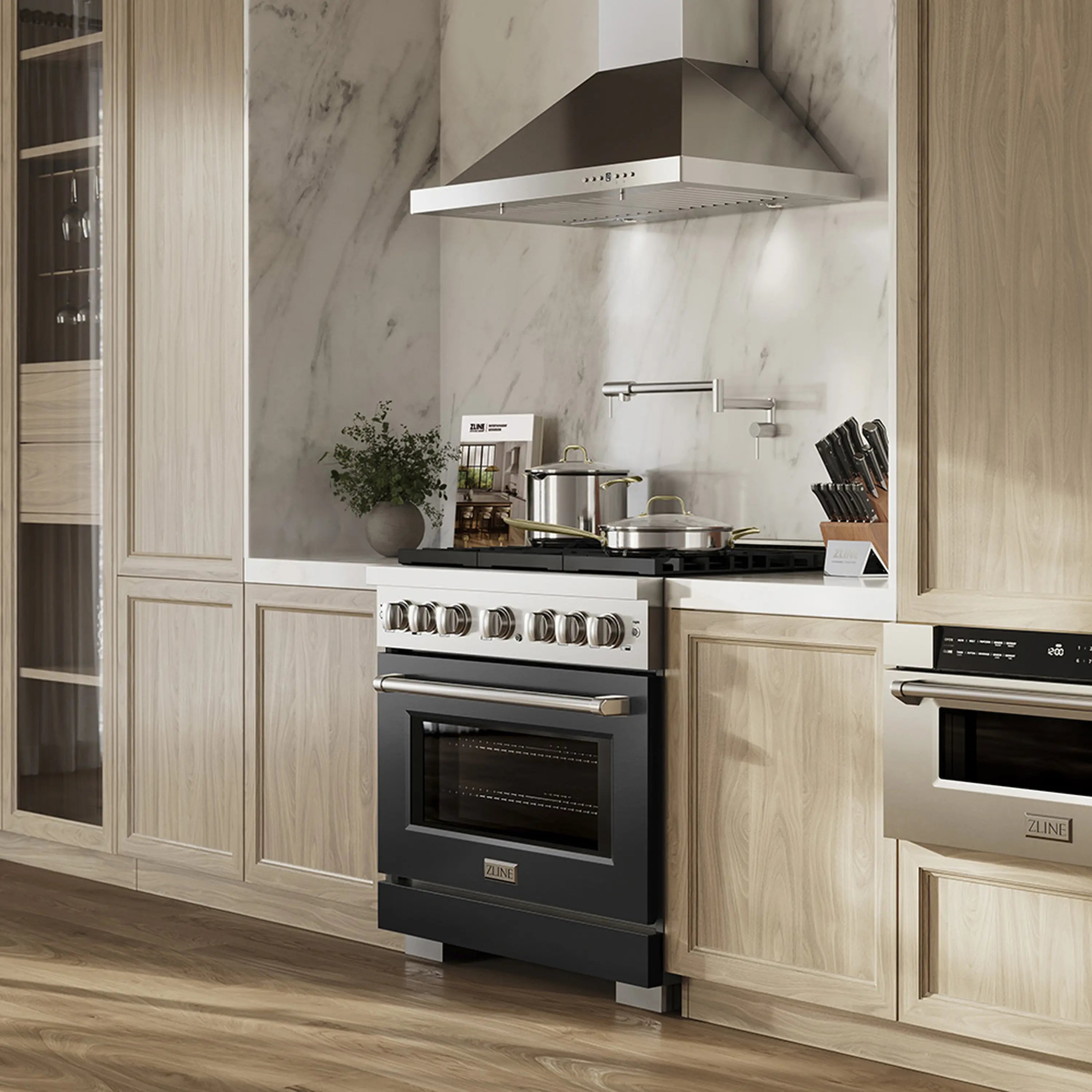Dual fuel range with black oven door and stainless cooktop controls