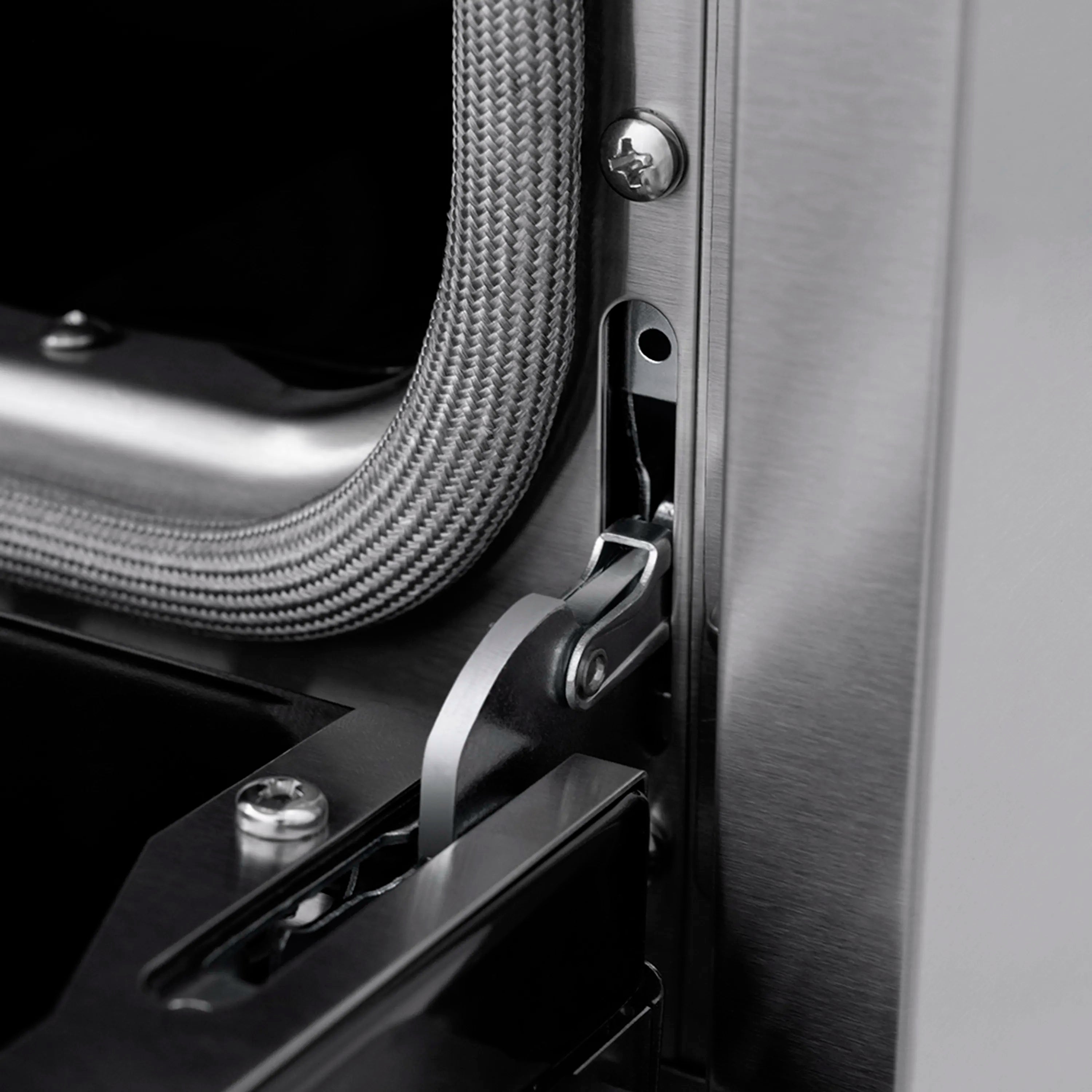 Stainless range side panel with control bracket and braided gas hose