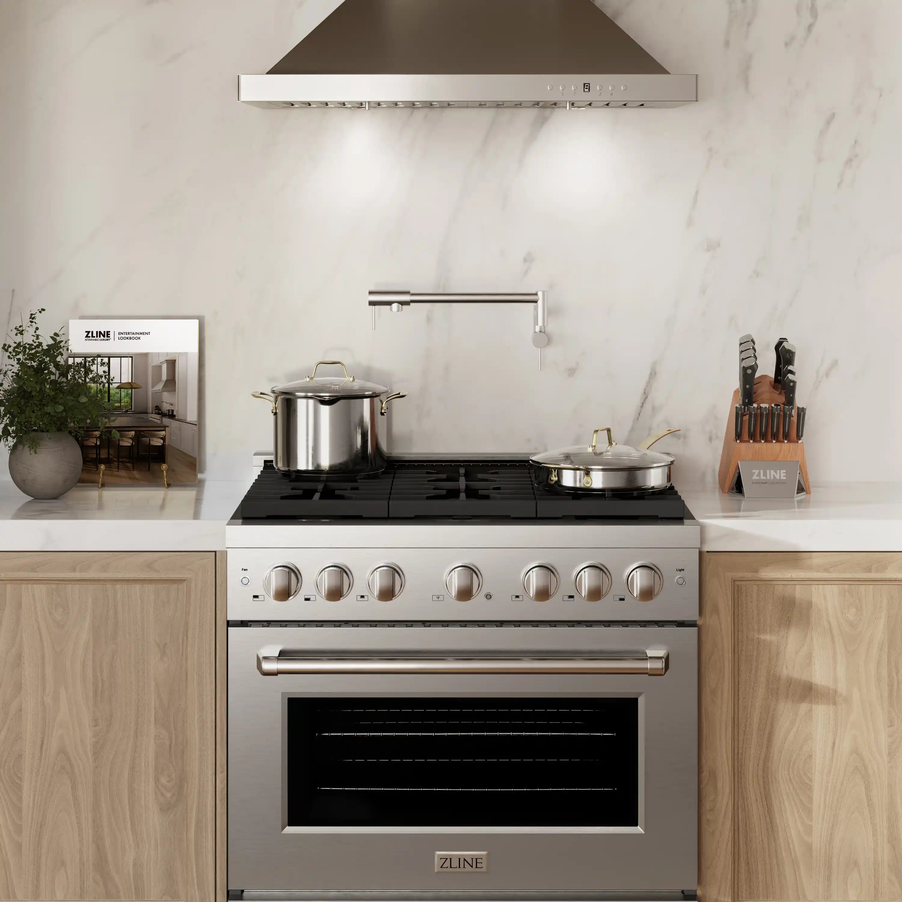 Stainless steel range with black cooktop grates and control knobs against backsplash
