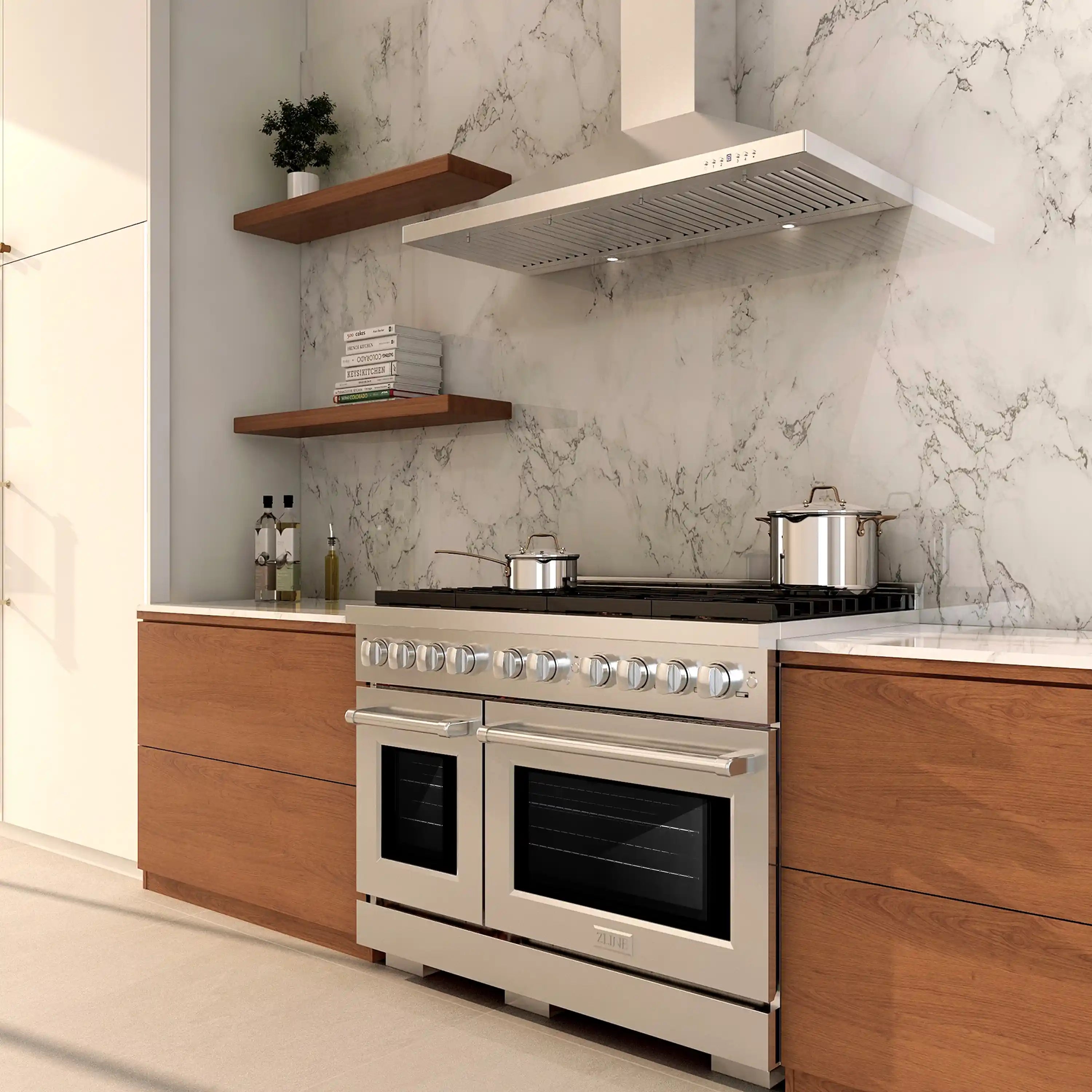 Stainless steel dual fuel range installed in kitchen with two oven doors and control knobs