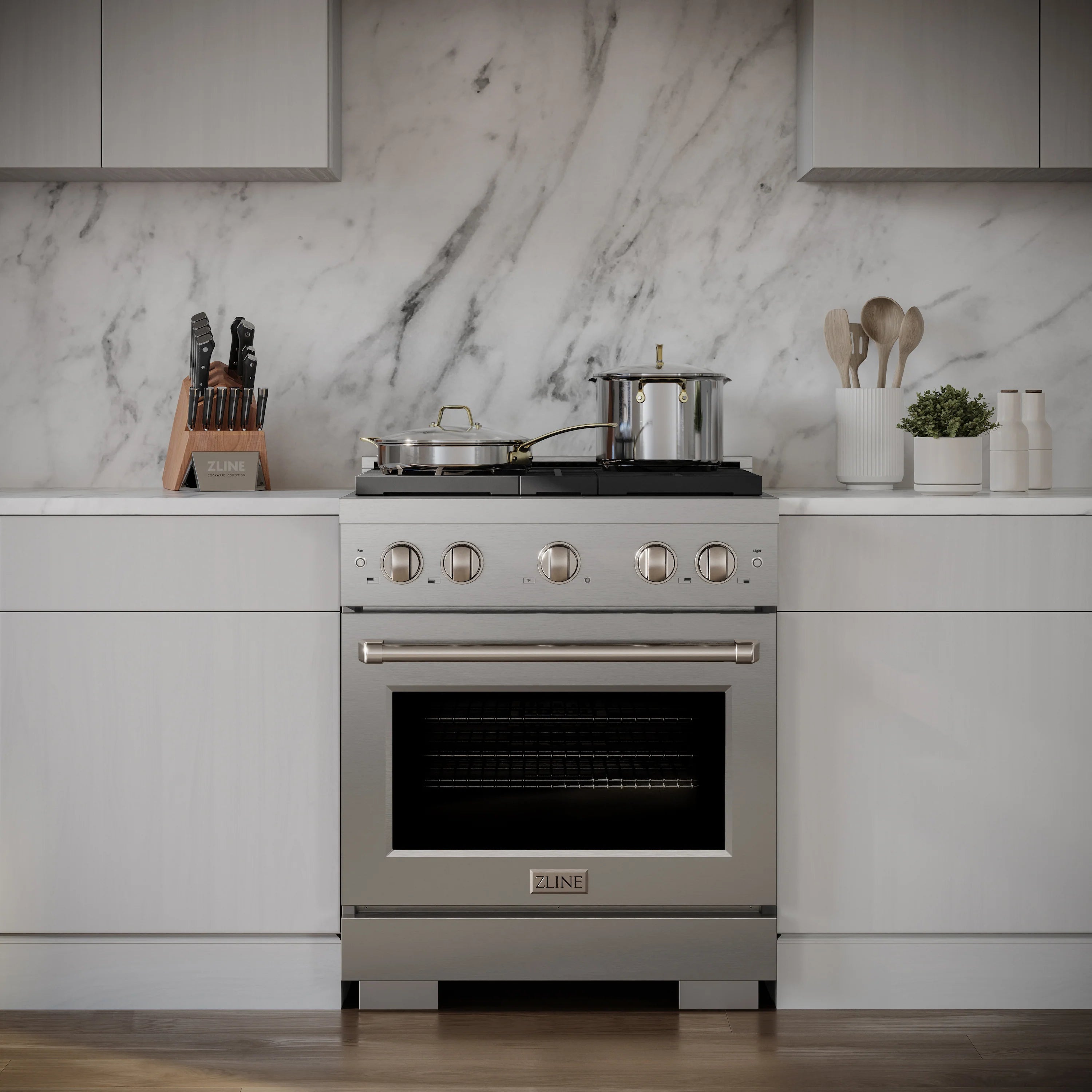 Stainless steel ZLINE gas range with burners and oven in a bright built-in kitchen