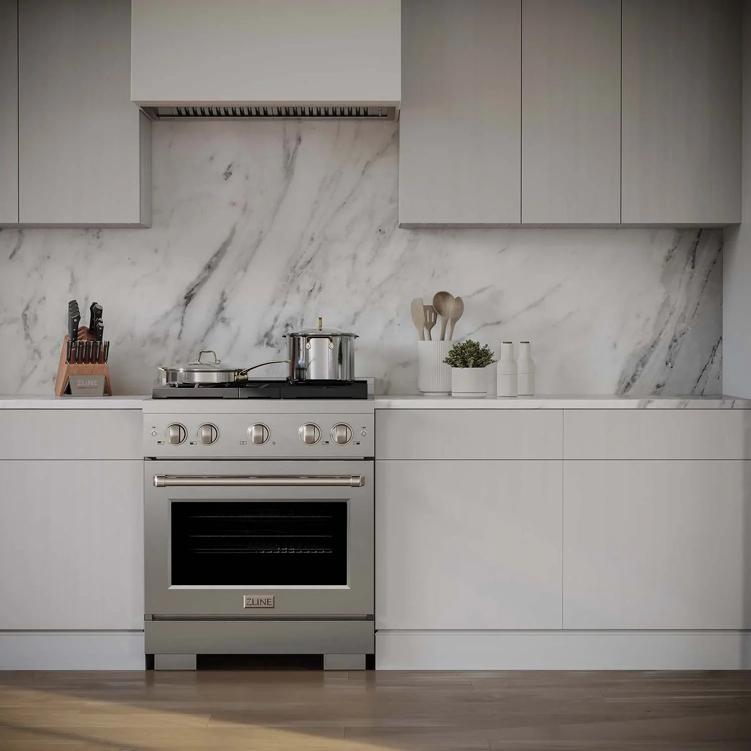 ZLINE freestanding gas range with range hood in a modern kitchen