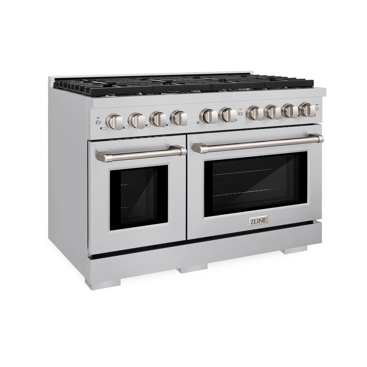 Stainless gas range from an angle with burner grates, dual doors, and control knobs
