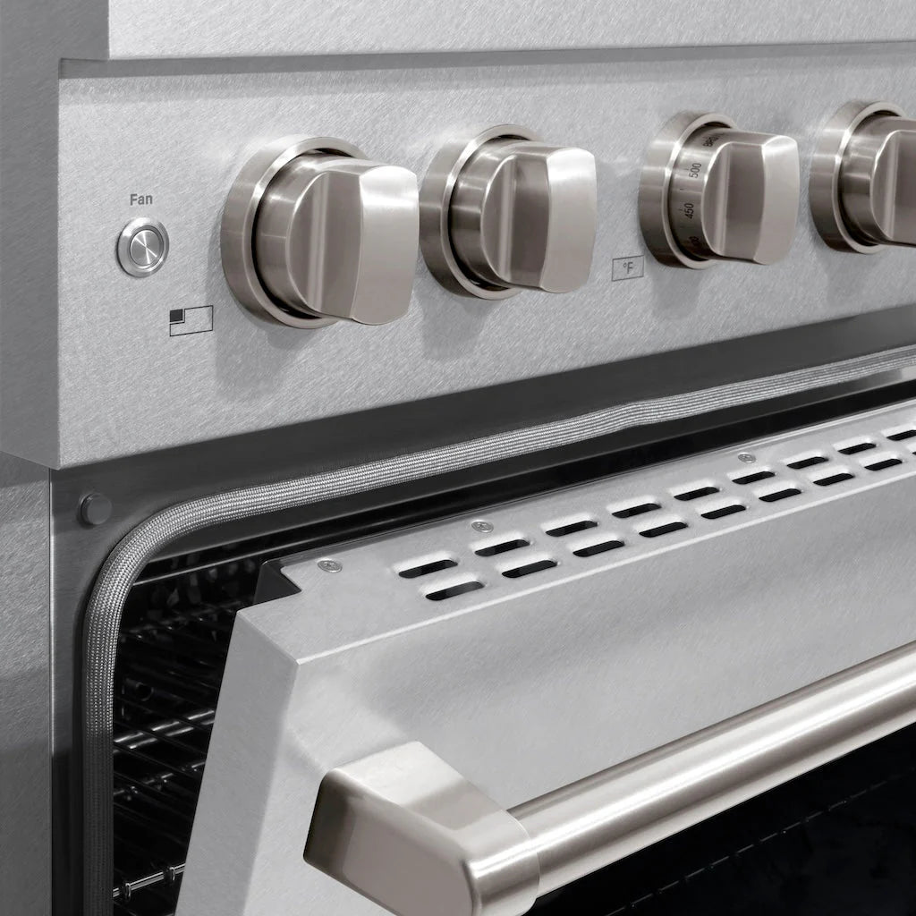 Stainless steel dishwasher control panel with fan knob and open interior rack