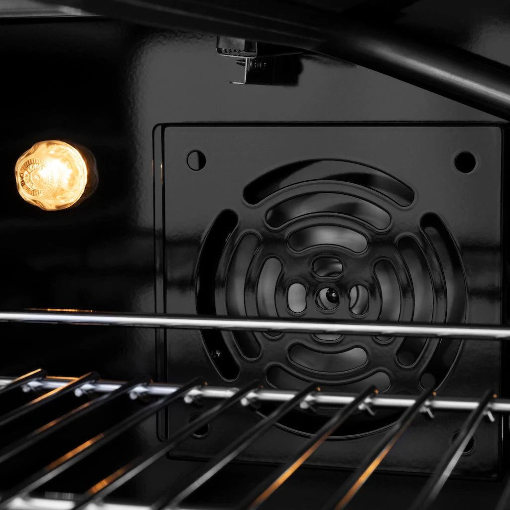 Gas oven interior with rack and glowing oven light