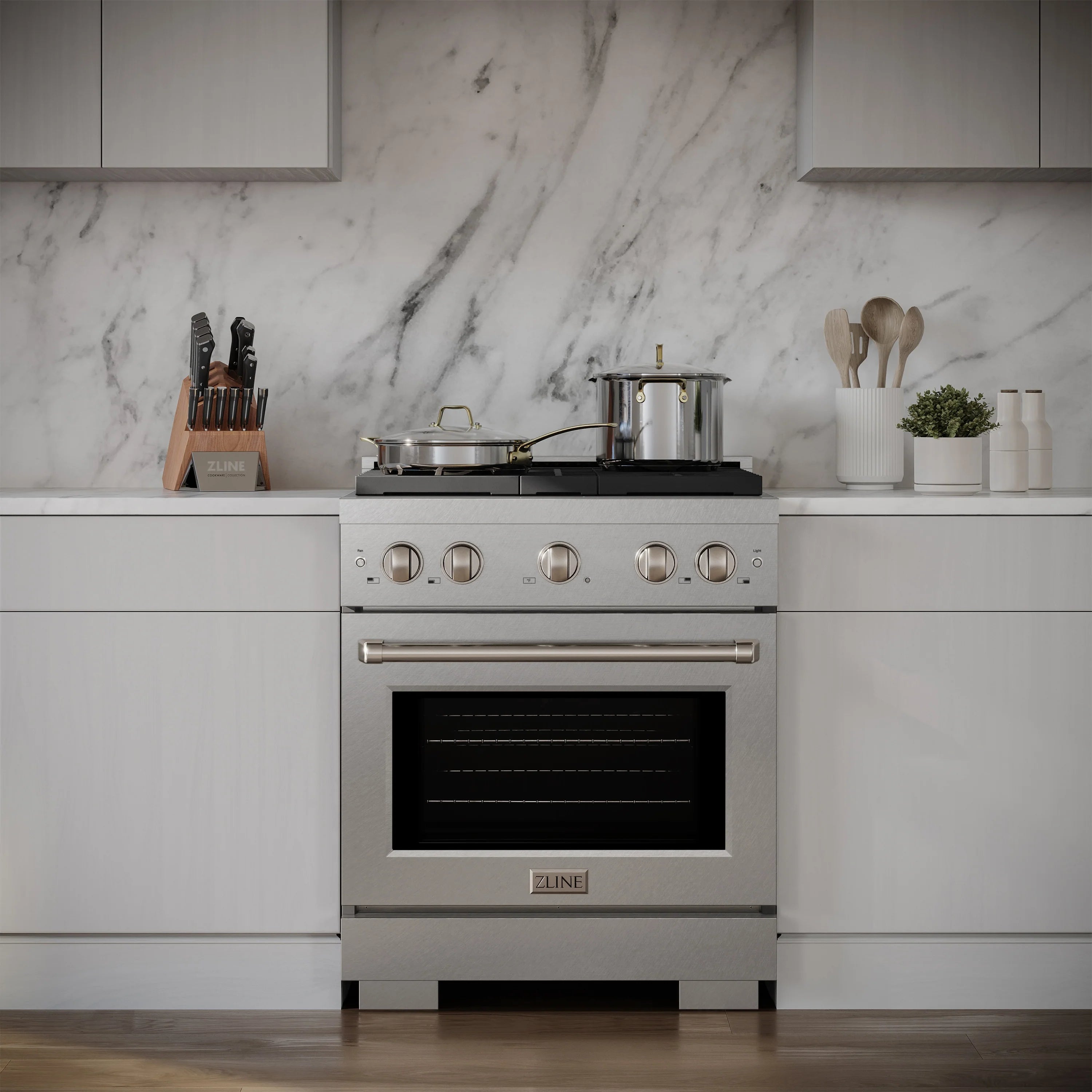Satin stainless steel gas range with convection oven and four burners, freestanding look