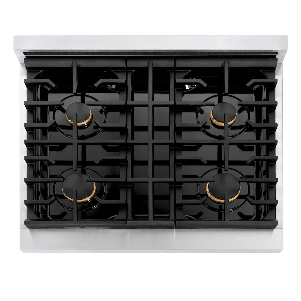Top view of four black burner grates with brass flame caps