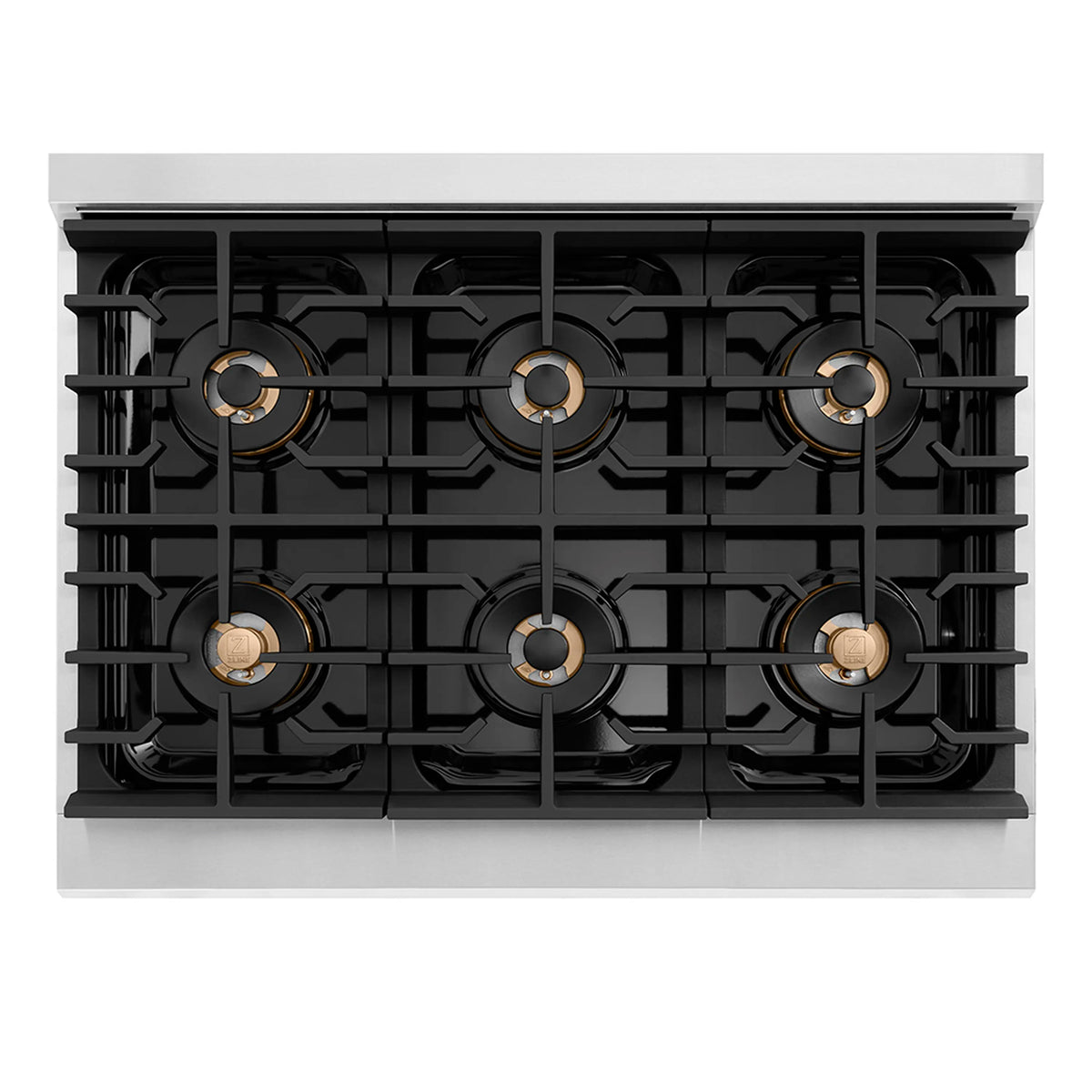 6-burner gas cooktop view with black grates and champagne bronze burner heads