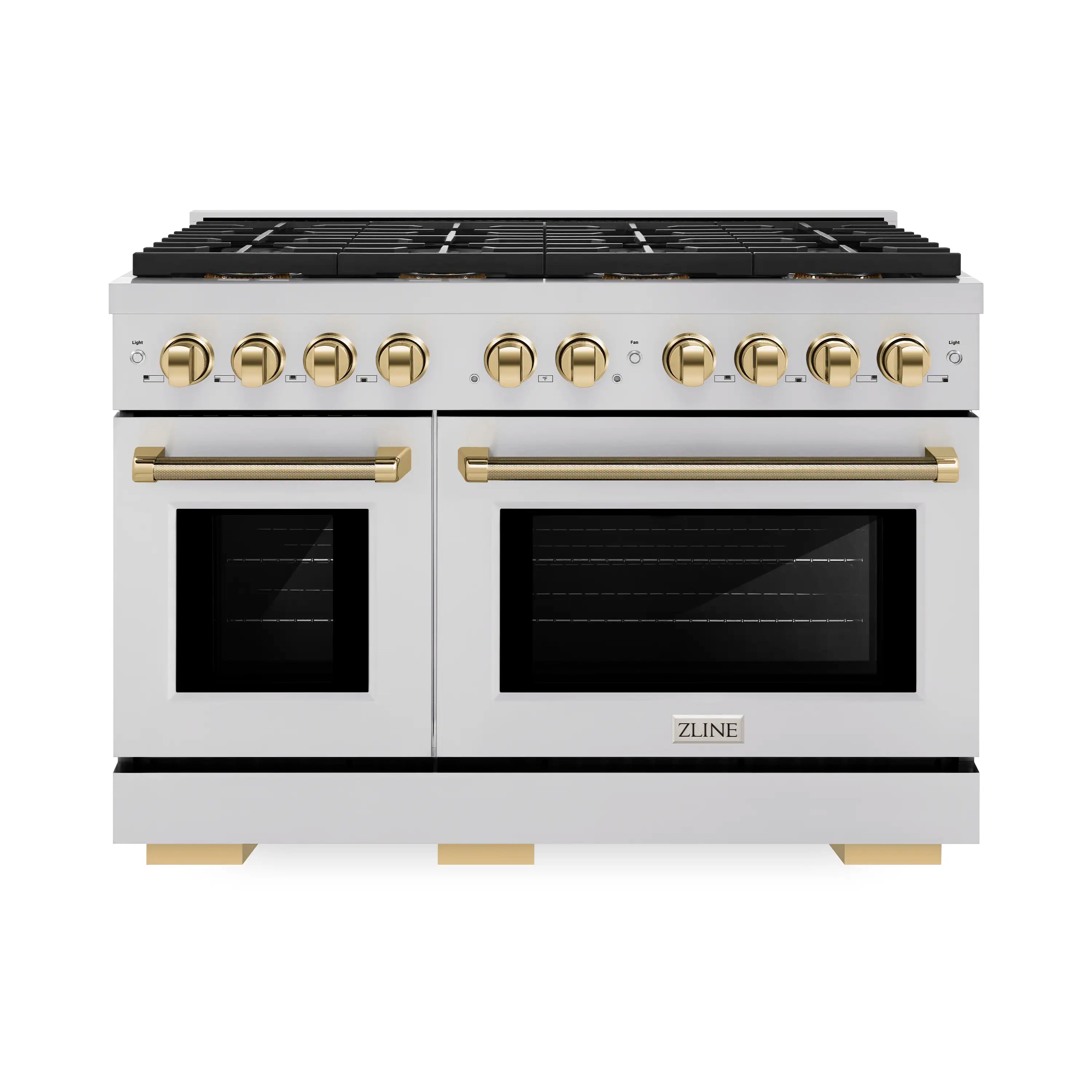 Stainless steel gas range front with two ovens, gold knobs, and gold helix handle doors