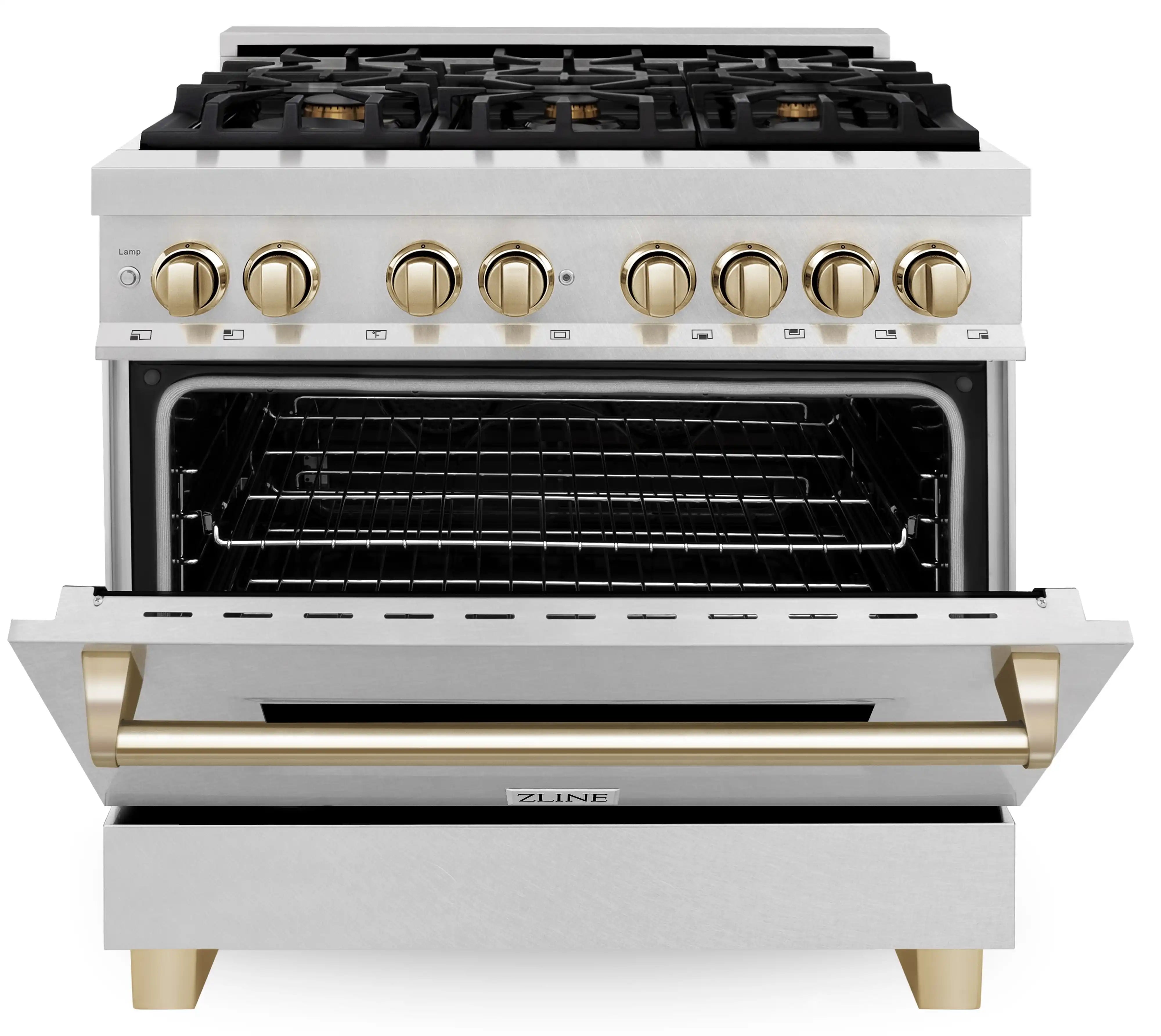 Dual fuel range with black cooktop, gold knobs, and open electric oven with racks