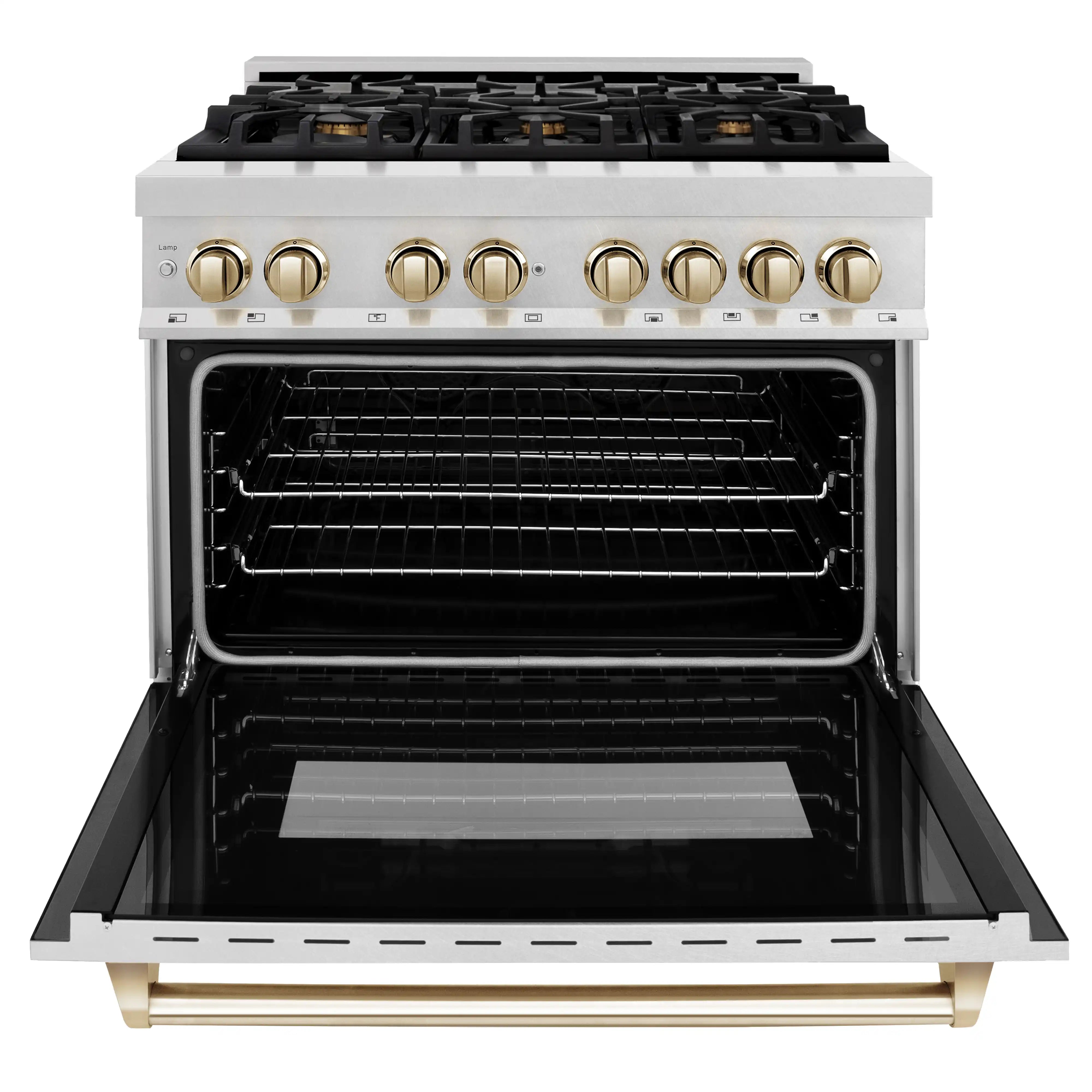 Dual fuel range with black oven interior, gold control knobs, and open oven door