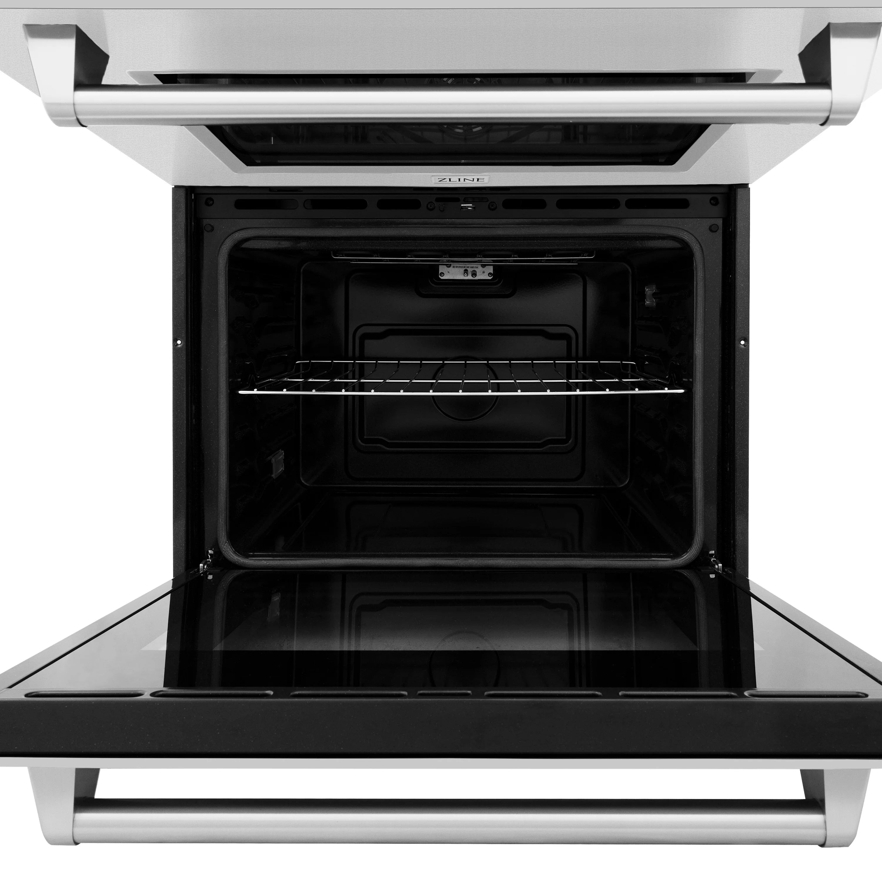 Open double oven cavity with two racks and dark interior