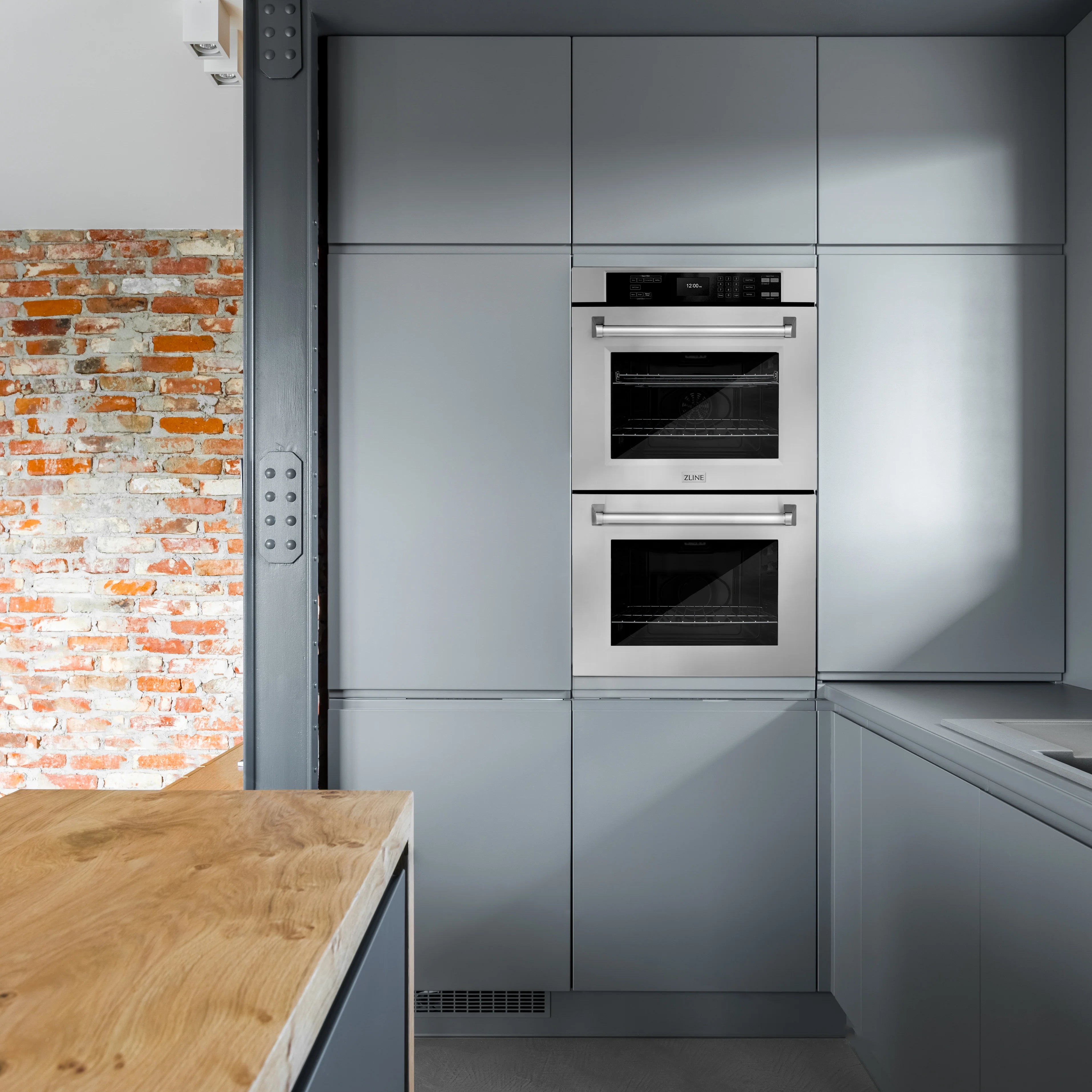 Stainless steel double wall oven with two door windows and control panel