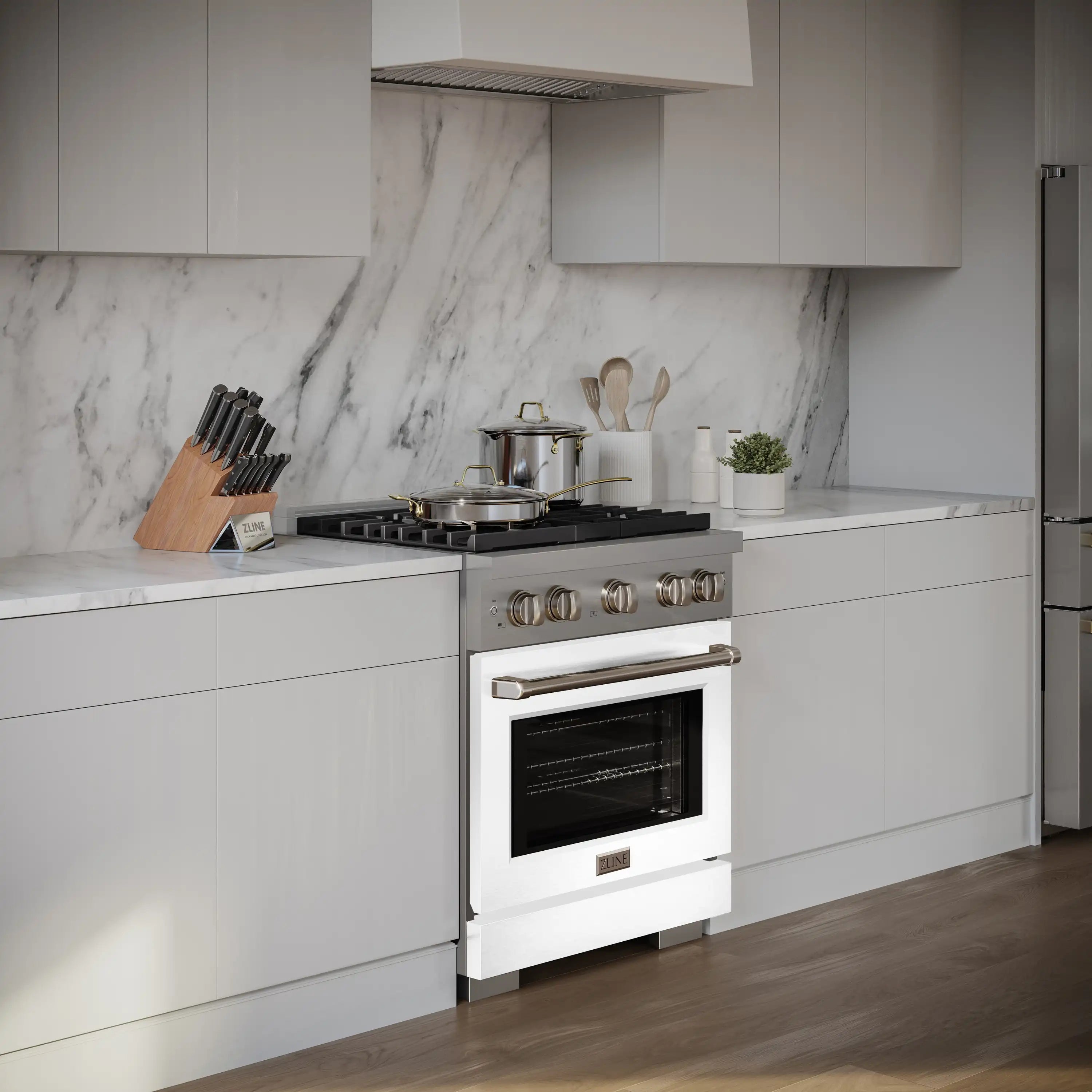 White dual fuel range with stainless handle and 4-burner cooktop