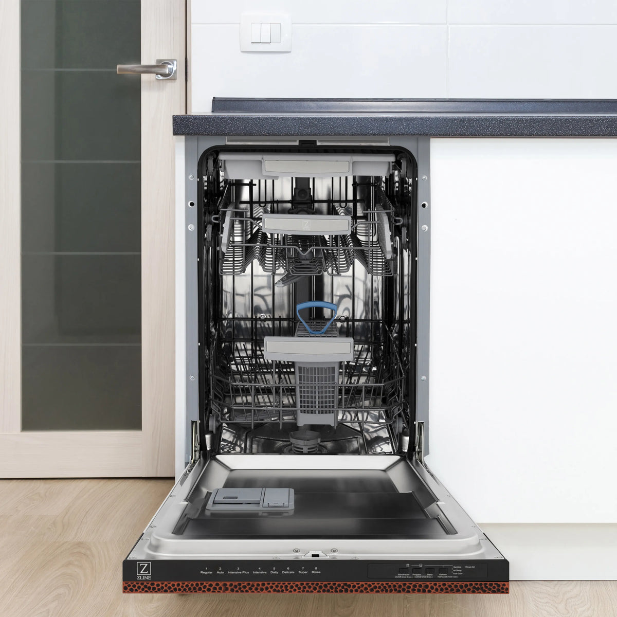 Built-in dishwasher with open door and visible stainless interior racks