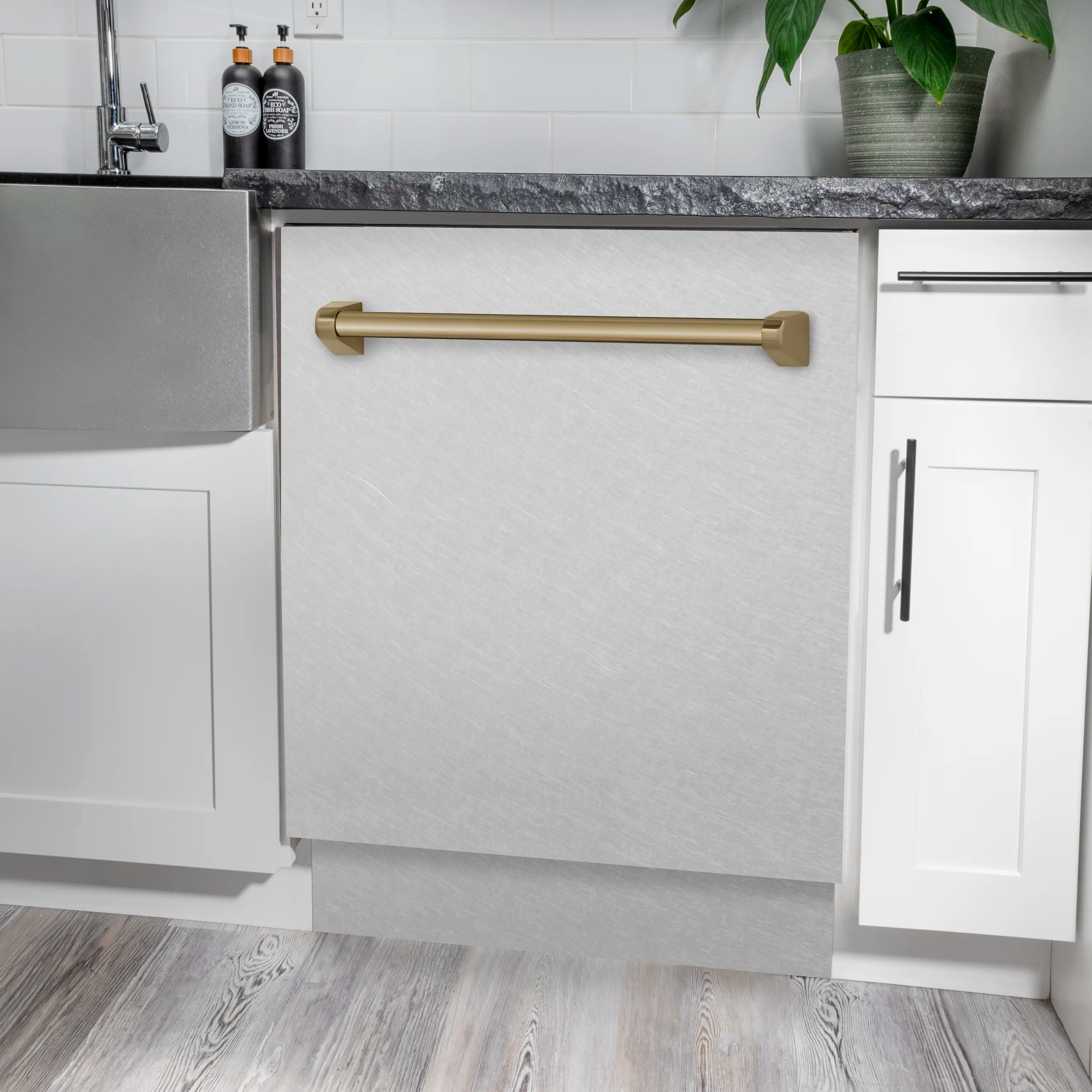 Satin stainless steel dishwasher with champagne bronze top handle, door open