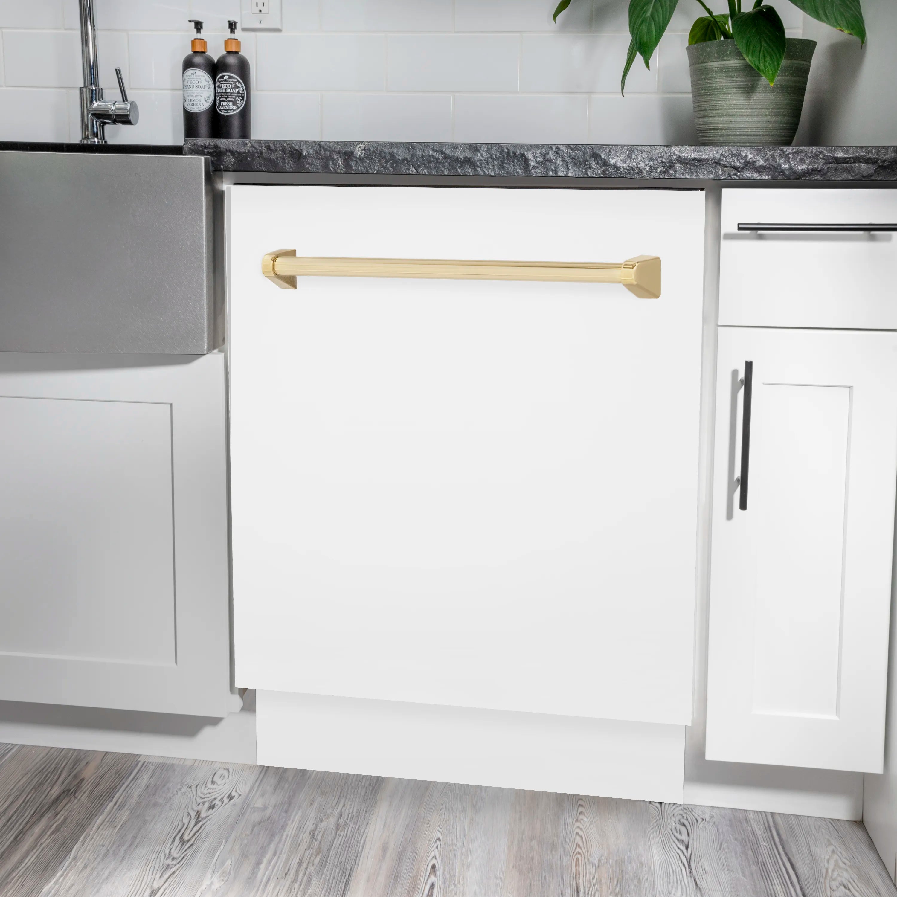 Built-in dishwasher door with gold handle and open white front