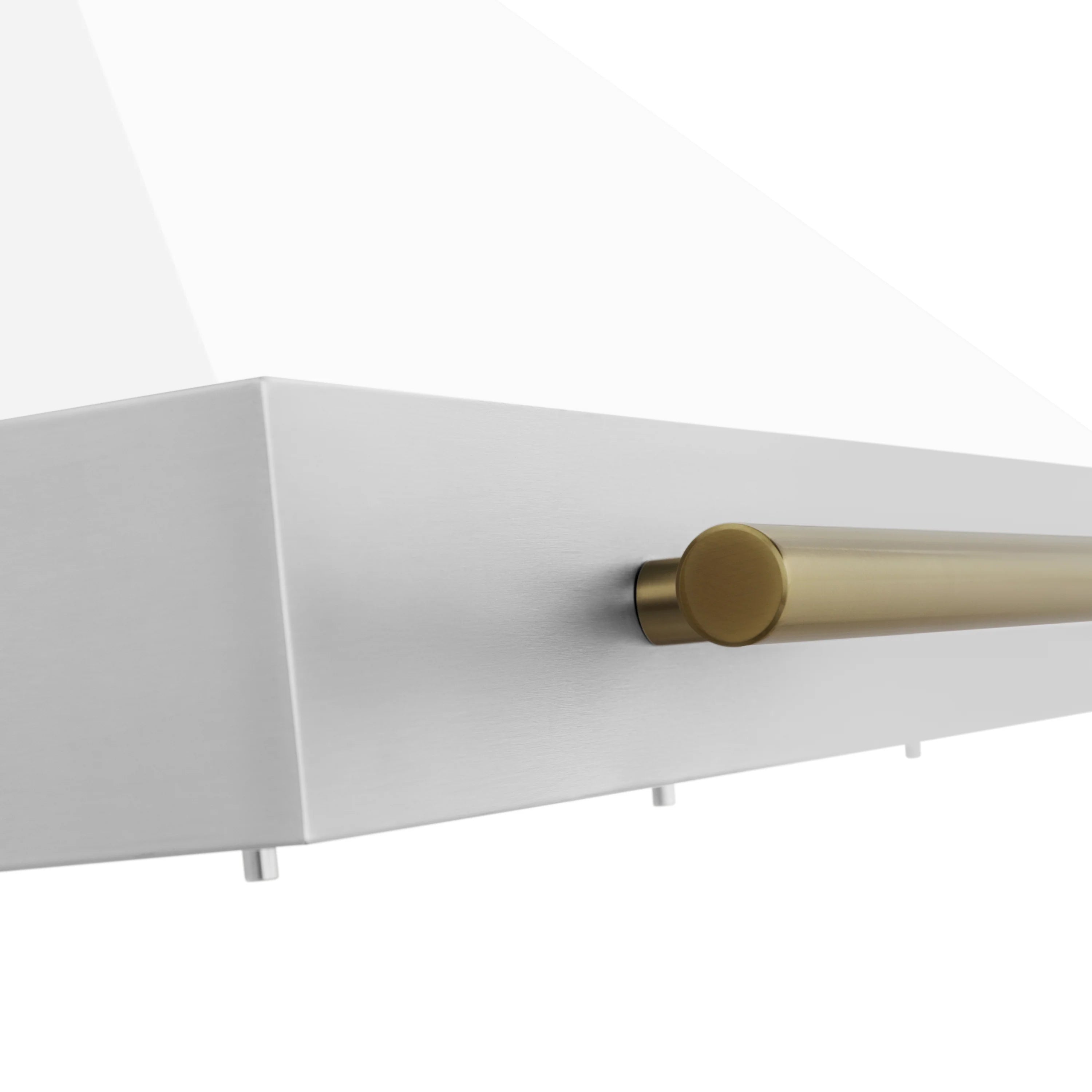 White range hood underside with bronze accent bar and vent slats