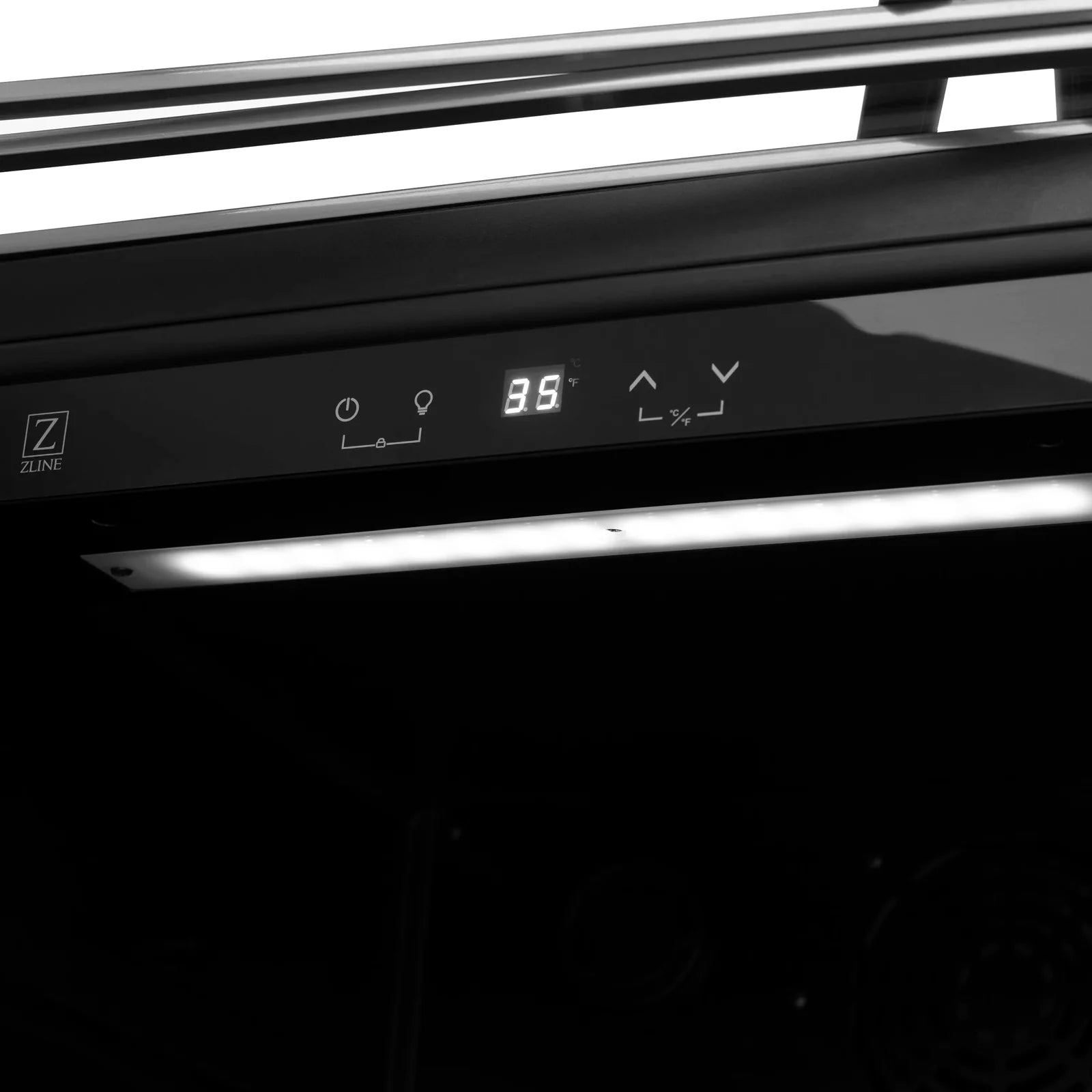 Black digital control panel with temperature display and touch icons on cooler door
